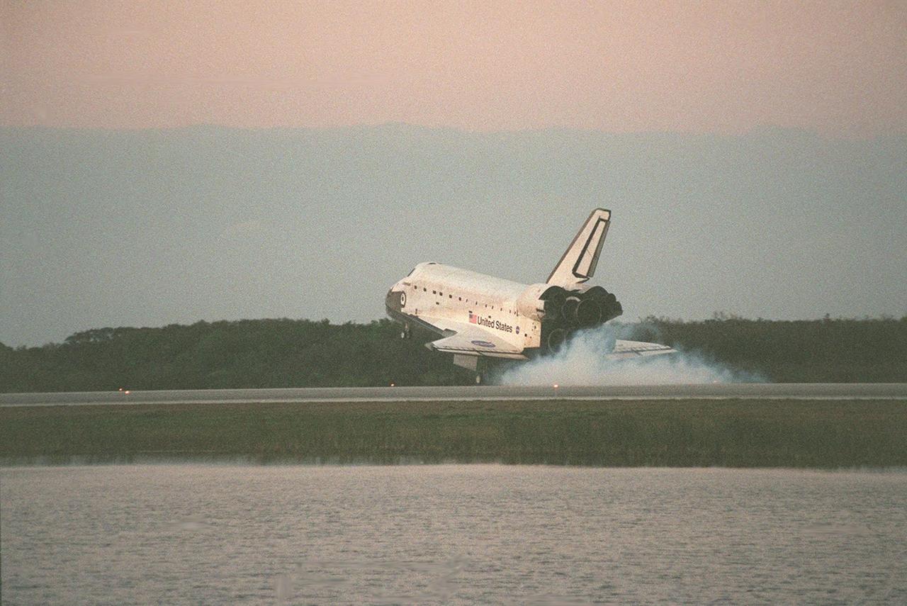 KENNEDY SPACE CENTER, FLA. -- Space Shuttle Endeavour stirs up dust as its wheels touch down on KSC's Shuttle Landing Facility Runway 33 to complete the 11-day, 5-hour, 38-minute-long STS-99 mission. At the controls are Commander Kevin Kregel and Pilot Dominic Gorie. Also onboard the orbiter are Mission Specialists Janet Kavandi, Janice Voss, Mamoru Mohri of Japan and Gerhard Thiele of Germany. Mohri is with the National Space Development Agency (NASDA) and Thiele is with the European Space Agency. The crew is returning from the Shuttle Radar Topography Mission after mapping more than 47 million square miles of the Earth's surface. Main gear touchdown was at 6:22:23 p.m. EST Feb. 22 , landing on orbit 181 of the mission. Nose gear touchdown was at 6:22:35 p.m.. EST, and wheel stop at 6:23:25 p.m. EST. This was the 97th flight in the Space Shuttle program and the 14th for Endeavour, also marking the 50th landing at KSC, the 21st consecutive landing at KSC, and the 28th in the last 29 Shuttle flights