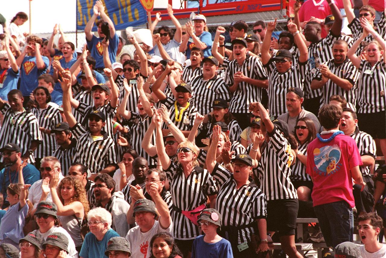The crowd filling the bleachers cheer and applaud during the closing presentations of the FIRST (For Inspiration and Recognition of Science and Technology) Southeast Regional competition held at the KSC Visitor Complex. Teams of high school students from all over the country tested the limits of their imagination using robots they designed, with the support of business and engineering professionals and corporate sponsors, to compete in a technological battle against other schools' robots. Of the 30 high school teams competing at the Southeast Regional event, 16 were Florida teams co-sponsored by NASA and KSC contractors. Local high schools participating are Astronaut, Bayside, Cocoa Beach, Eau Gallie, Melbourne, Melbourne Central Catholic, Palm Bay, Rockledge, Satellite, and Titusville