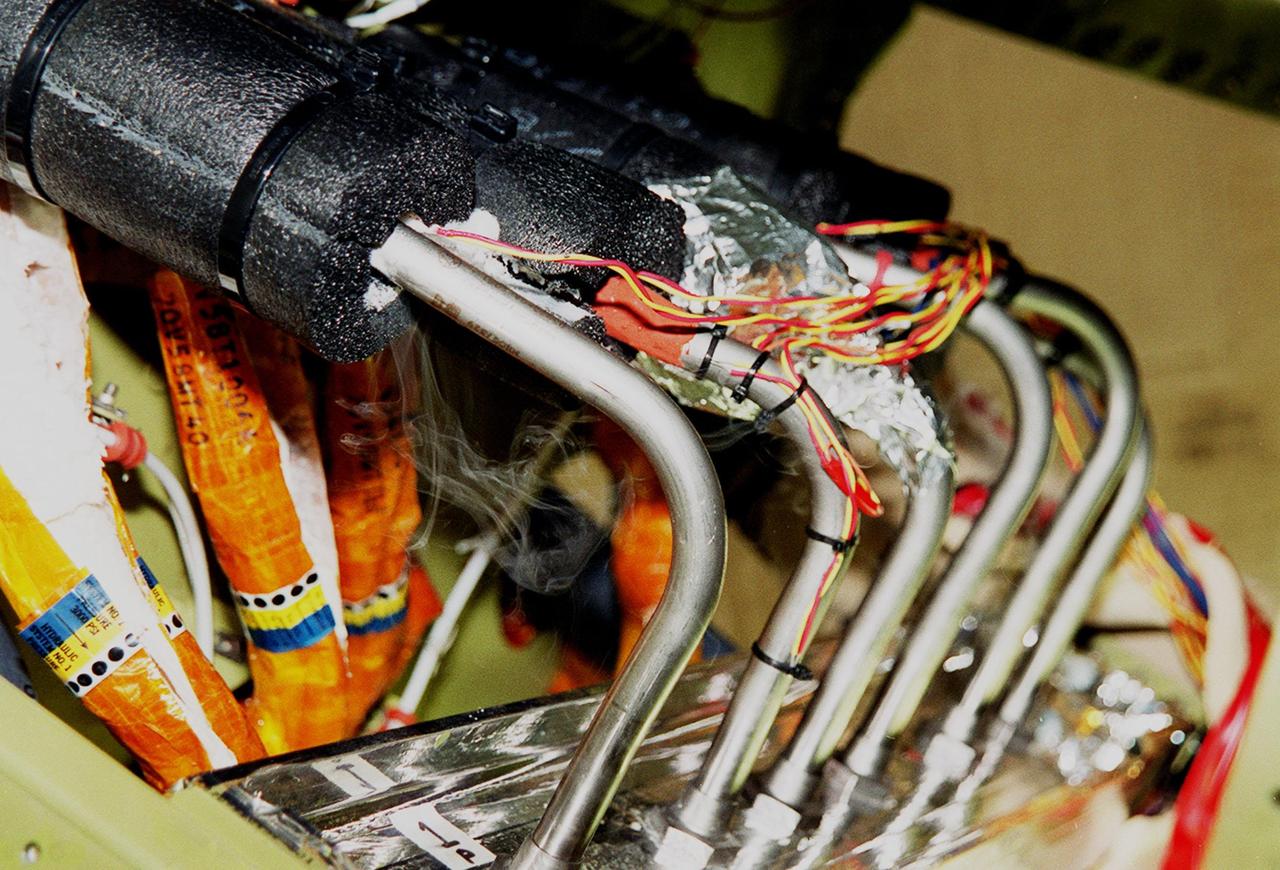 KENNEDY SPACE CENTER, FLA. -- Liquid nitrogen lines are being used to freeze portions of Space Shuttle Atlantis' hydraulic lines leading to and from the Power Drive Unit (PDU) to prevent air intrusion during its removal. PDU replacement is expected to occur without impacting the April 24 launch date on mission STS-101