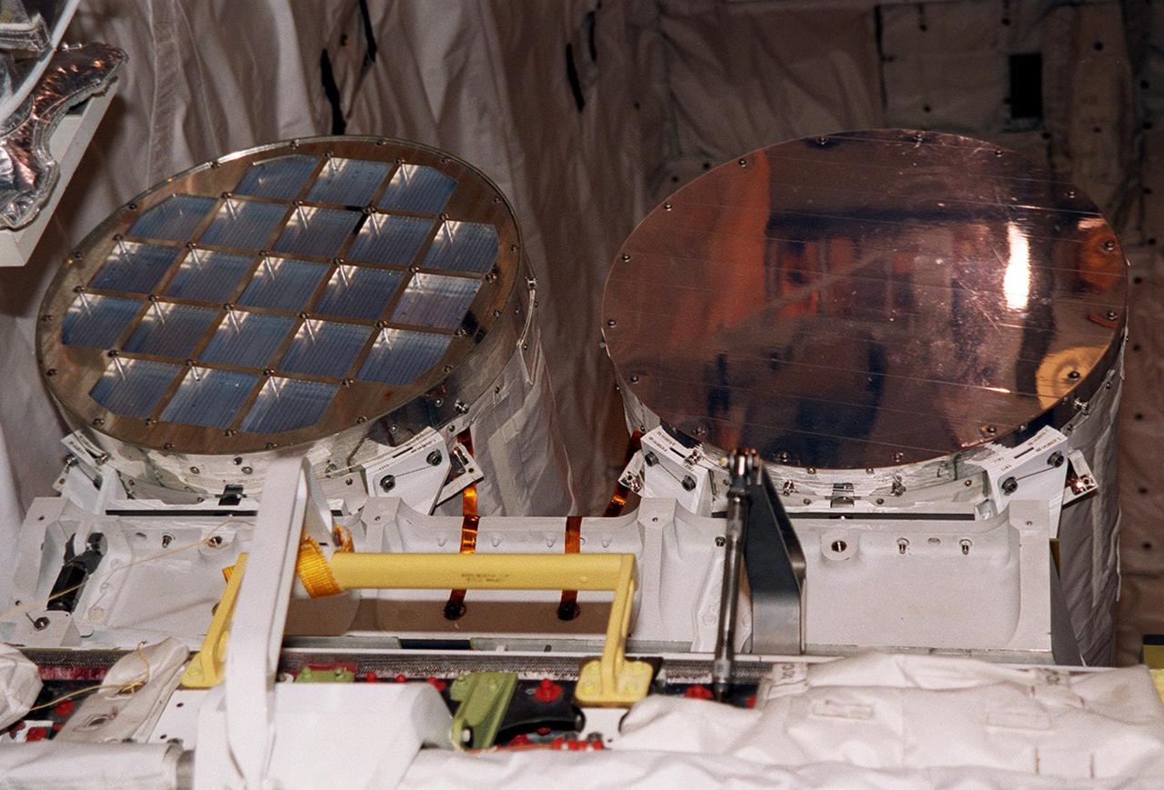 KENNEDY SPACE CENTER, FLA. -- Two GetAway Special (GAS) experiments SEM-06 (left) and MARS (right), part of the payload on mission STS-101, are seen here in the payload bay of Space Shuttle Atlantis prior to door closure. The SEM program is student-developed, focusing on the science of zero-gravity and microgravity. Selected student experiments on this sixth venture are testing the effects of space on Idaho tubers, seeds, paint, yeast, film, liquids, electronics and magnetic chips. MARS is the name for part of the KSC Space Life Sciences Outreach Program. It includes 20 participating schools (ranging from elementary to high school) from all over the nation and one in Canada who have been involved in KSC Space Life Sciences projects over the past seven years. The MARS payload has 20 tubes filled with materials for various classroom investigations designed by the MARS schools. The primary mission of STS-101 is to deliver logistics and supplies to the International Space Station, plus prepare the Station for the arrival of the Zvezda Service Module, expected to be launched by Russia in July 2000. The crew will conduct one space walk to perform maintenance on the Space Station. This will be the third assembly flight for the Space Station. STS-101 is scheduled to launch April 24 at 4:15 p.m. from Launch Pad 39A