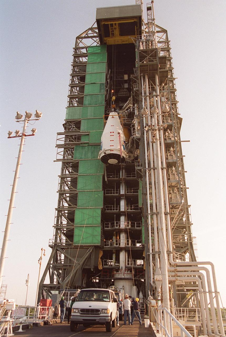 The GOES-L satellite is about midway in its journey up the gantry on pad 36A, Cape Canaveral Air Force Station. The Atlas IIA rocket is designed to launch payloads into low earth orbit, geosynchronous transfer orbit or geosynchronous orbit. The rocket is the launch vehicle for the GOES-L satellite, part of the NOAA National Weather Service system in weather imagery and atmospheric sounding information. The primary objective of the GOES-L is to provide a full capability satellite in an on-orbit storage condition, to assure NOAA continuity in services from a two-satellite constellation. Launch services are being provided by the 45th Space Wing. Launch is scheduled for May 3