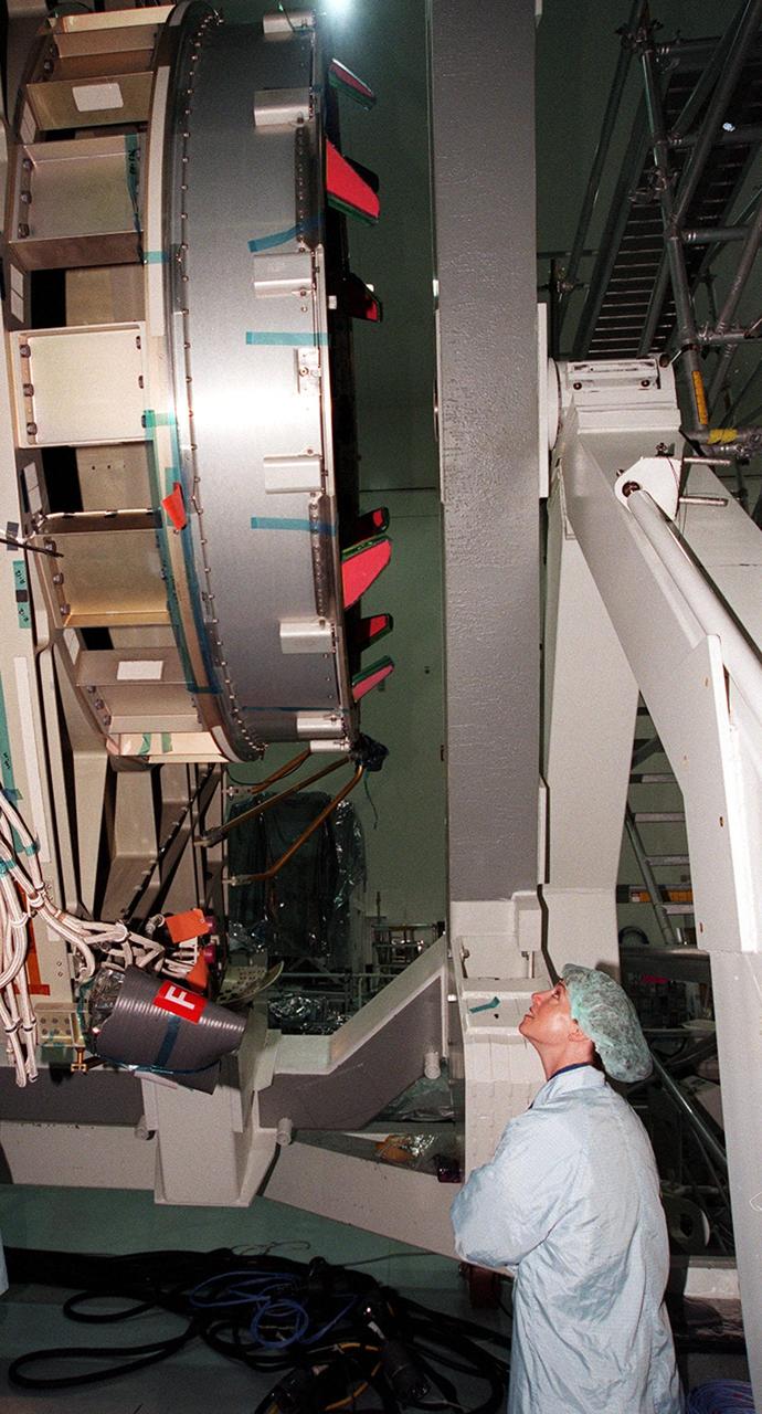 KENNEDY SPACE CENTER, FLA. -- In the Space Station Processing Facility, STS-92 Pilot Pamela A. Melroy gets a close look at the Integrated Truss Structure Z1 that will fly on the mission, the fifth U.S. flight in the construction of the International Space Station. Other crew members are Commander Brian Duffy, and Mission Specialists Koichi Wakata, Leroy Chaio, Peter J.K. Wisoff, Michael E. Lopez-Alegria, and William S. McArthur Jr. Wakata is with the National Space Development Agency of Japan. The Z1 is an early exterior framework to allow the first U.S. solar arrays on a future flight to be temporarily installed on Unity for early power. Another part of the payload is a pressurized mating adapter, PMA-3, to provide a Shuttle docking port for solar array installation on the sixth ISS flight and Lab installation on the seventh ISS flight. Launch of STS-92 is scheduled for Sept. 21, 2000