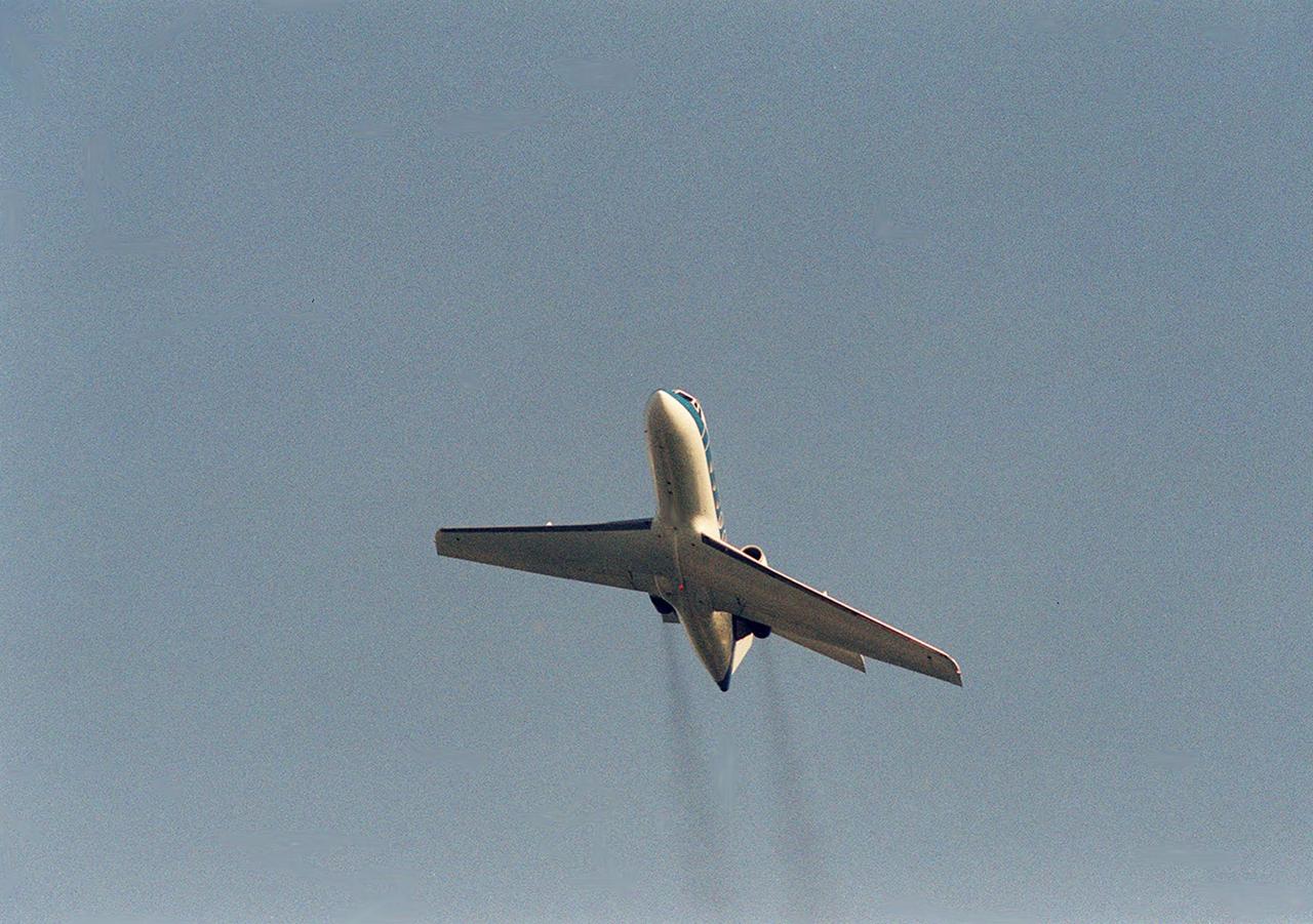 A Shuttle Training Aircraft (STA) soars into the blue sky above Kennedy Space Center. The STA is a modified Grumman American Aviation-built Gulfstream II executive jet that was modified to simulate an orbiter's cockpit, motion and visual cues, and handling qualities. It is used by Shuttle flight crews to practice landing the orbiter. In flight, the STA duplicates the orbiter's atmospheric descent trajectory from approximately 35,000 feet altitude to landing on a runway. The orbiter differs in at least one major aspect from conventional aircraft; it is unpowered during re-entry and landing so its high-speed glide must be perfectly executed the first time there is no go-around capability. The orbiter touchdown speed is 213 to 226 miles (343 to 364 kilometers) per hour. There are two STAs, based in Houston