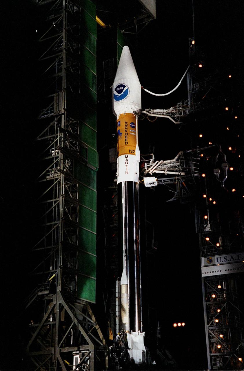 The Atlas II/Centaur rocket carrying the NASA/NOAA weather satellite GOES-L is revealed as the tower rolls back before launch. The primary objective of the GOES-L is to provide a full capability satellite in an on-orbit storage condition, in order to assure NOAA continuity in services from a two-satellite constellation. Launch services are being provided by the 45th Space Wing. Liftoff is targeted to occur at the opening of a launch window extending from 2:27 5:53 a.m. EDT, a duration of three hours and 27 minutes. Launch will occur from Pad A at Complex 36 on Cape Canaveral Air Force Station