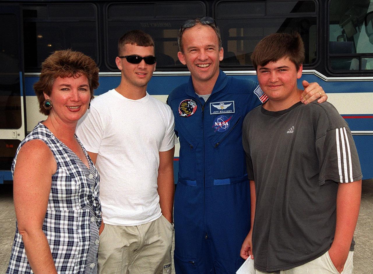 Members of the STS-101 crew gather with families and friends at Patrick Air Force Base before departure for Houston. Mission Specialist Jeffrey N. Williams is joined by his wife, Anna-Marie, and two sons. After landing at 2:20 a.m. EDT May 29, the crew and their families enjoyed the Memorial Day holiday in Florida. The crew returned from the third flight to the International Space Station where they made repairs, transferred cargo and completed a space walk to install and connect several pieces of equipment on the outside of the Space Station