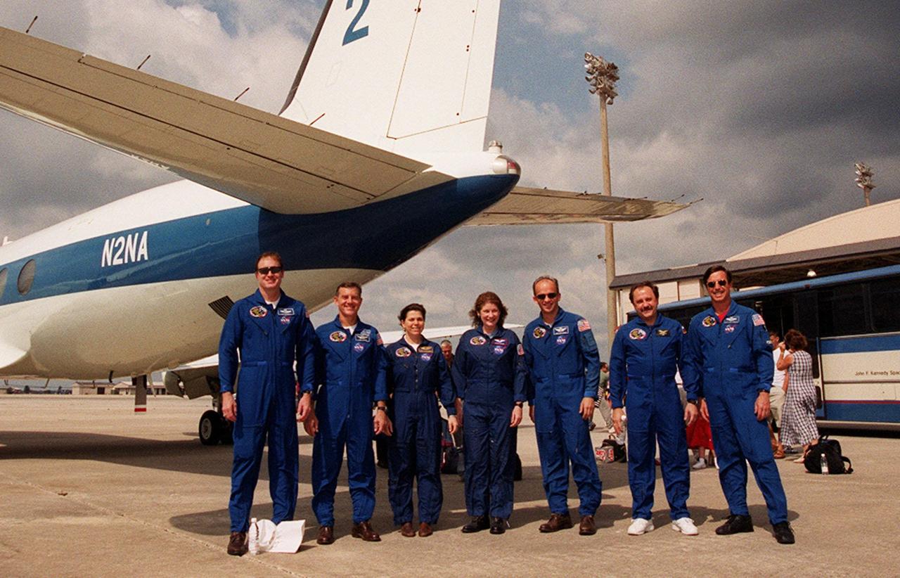 The STS-101 crew pose one more time before departing for Houston from Patrick Air Force Base. From left are Commander James D. Halsell Jr., Mission Specialists James S. Voss, Mary Ellen Weber, Susan J. Helms, Jeffrey N. Williams, Yury Usachev of Russia, and Pilot Scott “Doc” Horowitz. After landing at 2:20 a.m. EDT May 29, the crew and their families enjoyed the Memorial Day holiday in Florida. The crew returned from the third flight to the International Space Station where they made repairs, transferred cargo and completed a space walk to install and connect several pieces of equipment on the outside of the Space Station