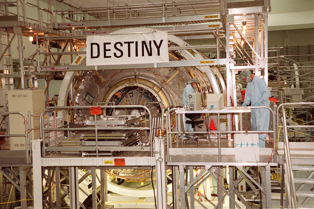 KENNEDY SPACE CENTER, FLA. -- In the Space Station Processing Facility, the U.S. Laboratory Destiny is about to undergo rotation in its workstand. A component of the International Space Station, Destiny is scheduled to fly on mission STS-98 in early 2001. During the mission, the crew will install the Lab during a series of three space walks. The STS-98 mission will provide the station with science research facilities and expand its power, life support and control capabilities. The U.S. Lab module continues a long tradition of microgravity materials research, first conducted by Skylab and later Shuttle and Spacelab missions. Destiny is expected to be a major feature in future research, providing facilities for biotechnology, fluid physics, combustion, and life sciences research