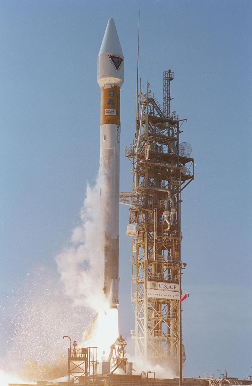 NASA’s Tracking and Data Relay Satellite (TDRS-H) rises into the blue sky from Pad 36A, Cape Canaveral Air Force Station. Liftoff occurred at 8:56 a.m. EDT aboard an Atlas IIA/Centaur rocket. One of three satellites (labeled H, I and J) being built by the Hughes Space and Communications Company, the latest TDRS uses an innovative springback antenna design. A pair of 15-foot-diameter, flexible mesh antenna reflectors fold up for launch, then spring back into their original cupped circular shape on orbit. The new satellites will augment the TDRS system’s existing Sand Ku-band frequencies by adding Ka-band capability. TDRS will serve as the sole means of continuous, high-data-rate communication with the space shuttle, with the International Space Station upon its completion, and with dozens of unmanned scientific satellites in low earth orbit