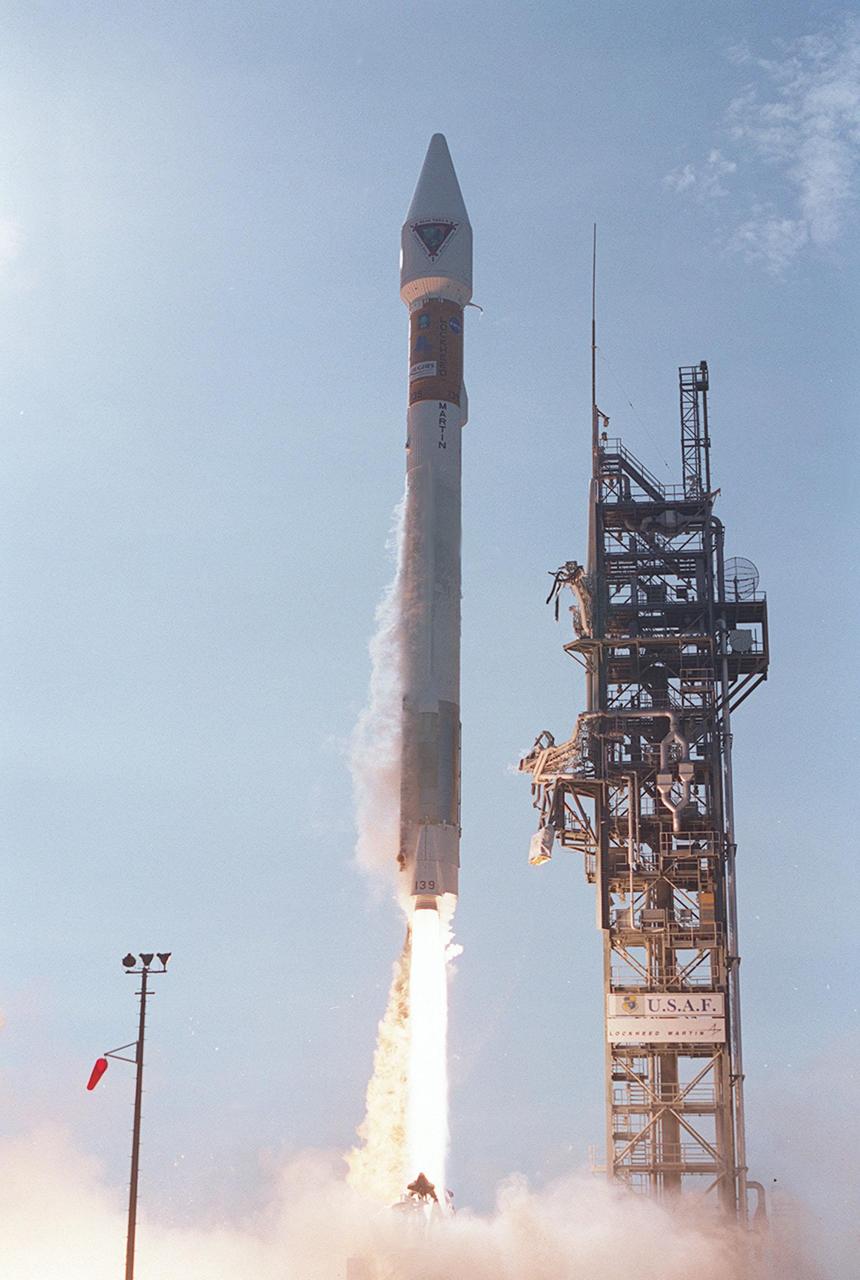 Looking like a Roman candle, NASA’s Tracking and Data Relay Satellite (TDRS-H) shoots into the blue sky aboard an Atlas IIA/Centaur rocket from Pad 36A, Cape Canaveral Air Force Station. Liftoff occurred at 8:56 a.m. EDT. One of three satellites (labeled H, I and J) being built by the Hughes Space and Communications Company, the latest TDRS uses an innovative springback antenna design. A pair of 15-foot-diameter, flexible mesh antenna reflectors fold up for launch, then spring back into their original cupped circular shape on orbit. The new satellites will augment the TDRS system’s existing Sand Ku-band frequencies by adding Ka-band capability. TDRS will serve as the sole means of continuous, high-data-rate communication with the space shuttle, with the International Space Station upon its completion, and with dozens of unmanned scientific satellites in low earth orbit