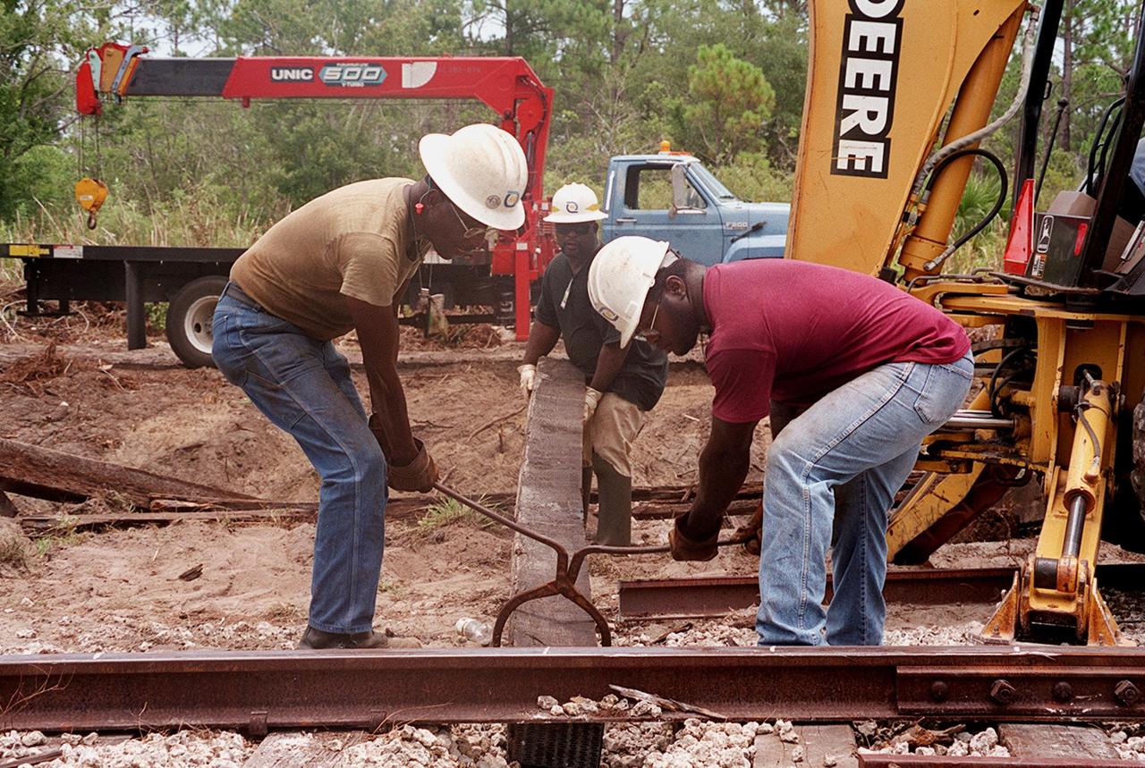 The railroad tracks are under repair at Kennedy Space Center. This section of track is located on KSC property, just north of the NASA Causeway in the KSC Industrial Area. The repairs were required following the minor derailment of two solid rocket booster segment cars on July 18