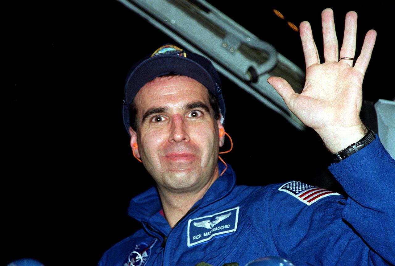 STS-106 Mission Specialist Richard A. Mastracchio waves at the camera upon his arrival at the KSC Shuttle Landing Facility. He and the rest of the crew will be making pre-launch preparations for the fourth flight to the International Space Station. STS-106 is scheduled to launch Sept. 8, 2000, at 8:45 a.m. EDT from Launch Pad 39B. On the 11-day mission, the seven-member crew will perform support tasks on orbit, transfer supplies and prepare the living quarters in the newly arrived Zvezda Service Module. The first long-duration crew, dubbed “Expedition One,” is due to arrive at the Station in late fall