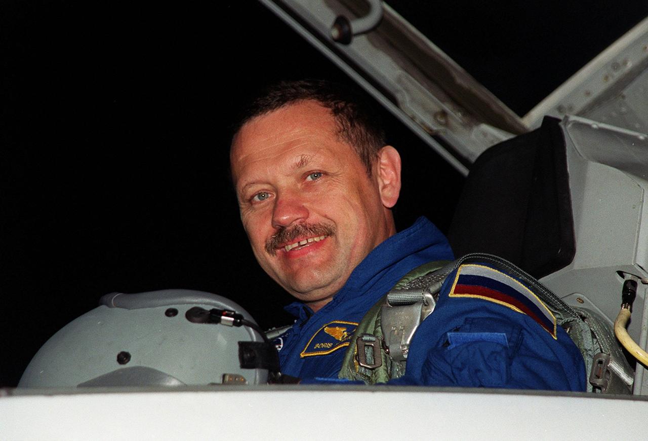 STS-106 Mission Specialist Boris V. Morukov smiles upon his arrival at the KSC Shuttle Landing Facility. He and the rest of the crew will be making pre-launch preparations for the fourth flight to the International Space Station. STS-106 is scheduled to launch Sept. 8, 2000, at 8:45 a.m. EDT from Launch Pad 39B. On the 11-day mission, the seven-member crew will perform support tasks on orbit, transfer supplies and prepare the living quarters in the newly arrived Zvezda Service Module. The first long-duration crew, dubbed “Expedition One,” is due to arrive at the Station in late fall