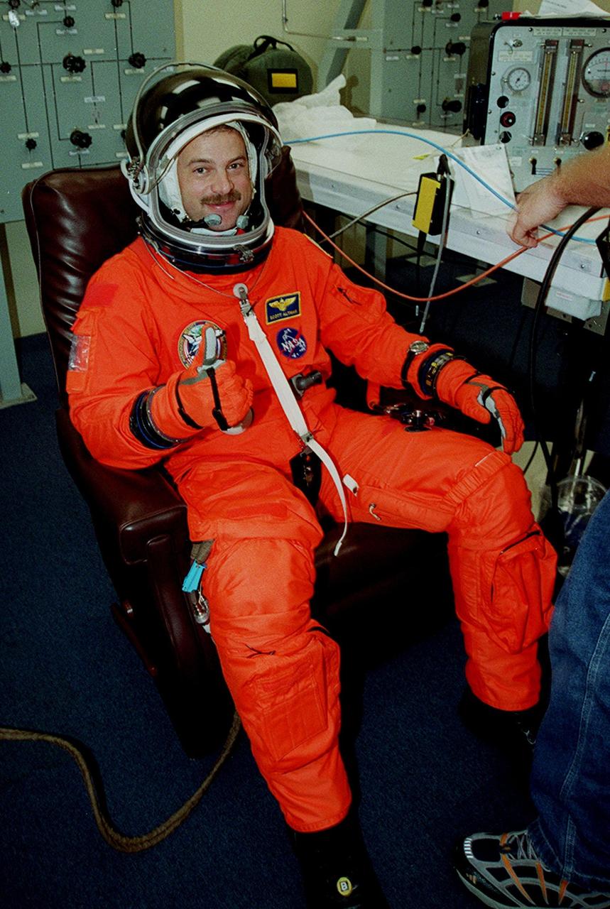 STS-106 Pilot Scott D. Altman is suited up in the Operations and Checkout Building and ready for launch. This is Altman’s second space flight. Space Shuttle Atlantis is set to lift off 8:45 a.m. EDT on the fourth flight to the International Space Station. During the 11-day mission, the seven-member crew will perform support tasks on orbit, transfer supplies and prepare the living quarters in the newly arrived Zvezda Service Module. The first long-duration crew, dubbed “Expedition One,” is due to arrive at the Station in late fall
