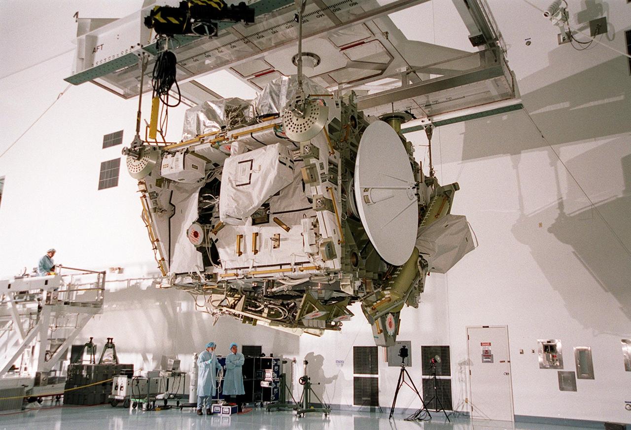 In the Space Station Processing Facility, the Integrated Truss Structure Z1, an element of the International Space Station, is moved to another stand to check its weight and balance. The Z1 truss is the first of 10 trusses that will become the backbone of the Space Station, eventually stretching the length of a football field. Along with its companion payload, the third Pressurized Mating Adapter, the Z1 is scheduled to be launched aboard Space Shuttle Discovery Oct. 5 at 9:38 p.m. EDT. The launch will be the 100th in the Shuttle program