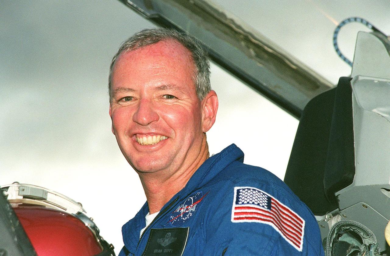 KENNEDY SPACE CENTER, FLA. -- STS-92 Commander Brian Duffy is happy to return to KSC for the launch of Space Shuttle Discovery on Oct. 5. . He and other crew members Pilot Pamela Ann Melroy and Mission Specialists Koichi Wakata of Japan, Leroy Chiao, Peter J.K. “Jeff” Wisoff, Michael E. Lopez-Alegria and William S. McArthur Jr. expressed their eagerness to launch to a waiting group of media at the Shuttle Landing Facility. The mission is the fifth flight for the construction of the International Space Station. The payload includes the Integrated Truss Structure Z-1 and the third Pressurized Mating Adapter. During the 11-day mission, four extravehicular activities (EVAs), or space walks, are planned.