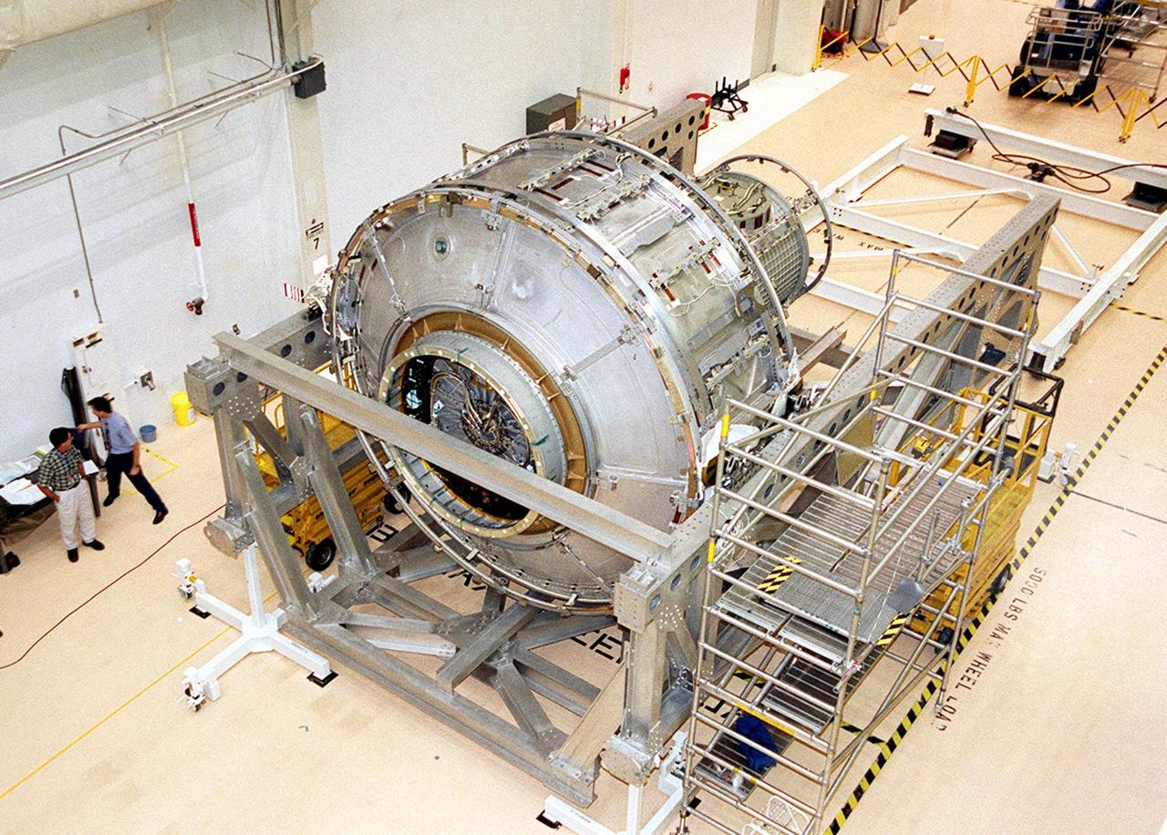 KENNEDY SPACE CENTER, FLA. -- In the Operations and Checkout Building, the Joint Airlock Module is ready to be lifted and placed in the payload canister for transfer to the Space Station Processing Facility. There it will continue to undergo preflight processing for the STS-104 mission scheduled for launch aboard Space Shuttle Atlantis May 17, 2001. The Joint Airlock Module is the gateway from which crew members aboard the International Space Station will enter and exit the 470-ton orbiting research facility