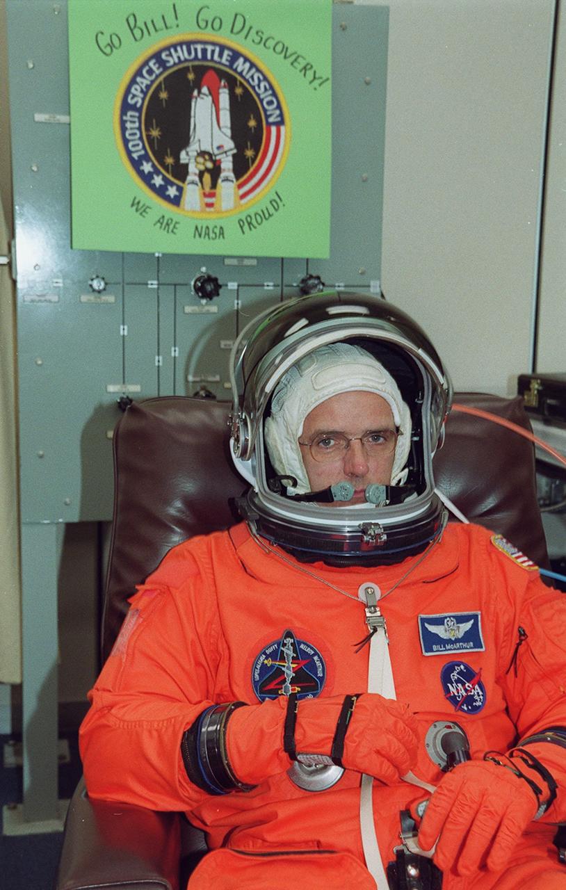 STS-92 Mission Specialist William S. McArthur Jr. signals thumbs up for launch, scheduled for 8:05 p.m. EDT. The mission is the fifth flight for the construction of the ISS. The payload includes the Integrated Truss Structure Z-1 and the third Pressurized Mating Adapter. During the 11-day mission, four extravehicular activities (EVAs), or spacewalks, are planned. The Z-1 truss is the first of 10 that will become the backbone of the International Space Station, eventually stretching the length of a football field. PMA-3 will provide a Shuttle docking port for solar array installation on the sixth ISS flight and Lab installation on the seventh ISS flight. This launch is the third for McArthur. Landing is expected Oct. 21 at 3:55 p.m. EDT