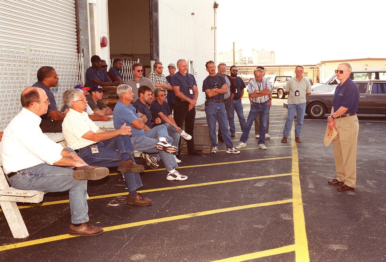 Center Director Roy Bridges talks to workers outside the Hazardous Maintenance Facility during Super Safety and Health Day at KSC. Safety Day is a full day of NASA-sponsored, KSC and 45th Space Wing events involving a number of health and safety related activities: Displays, vendors, technical paper sessions, panel discussions, a keynote speaker, etc. The entire Center and Wing stand down to participate in the planned events. Safety Day is held annually to proactively increase awareness in safety and health among the government and contractor workforce population. The first guiding principle at KSC is “Safety and Health First.” KSC’s number one goal is to “Assure sound, safe and efficient practices and processes are in place for privatized/commercialized launch site processing.