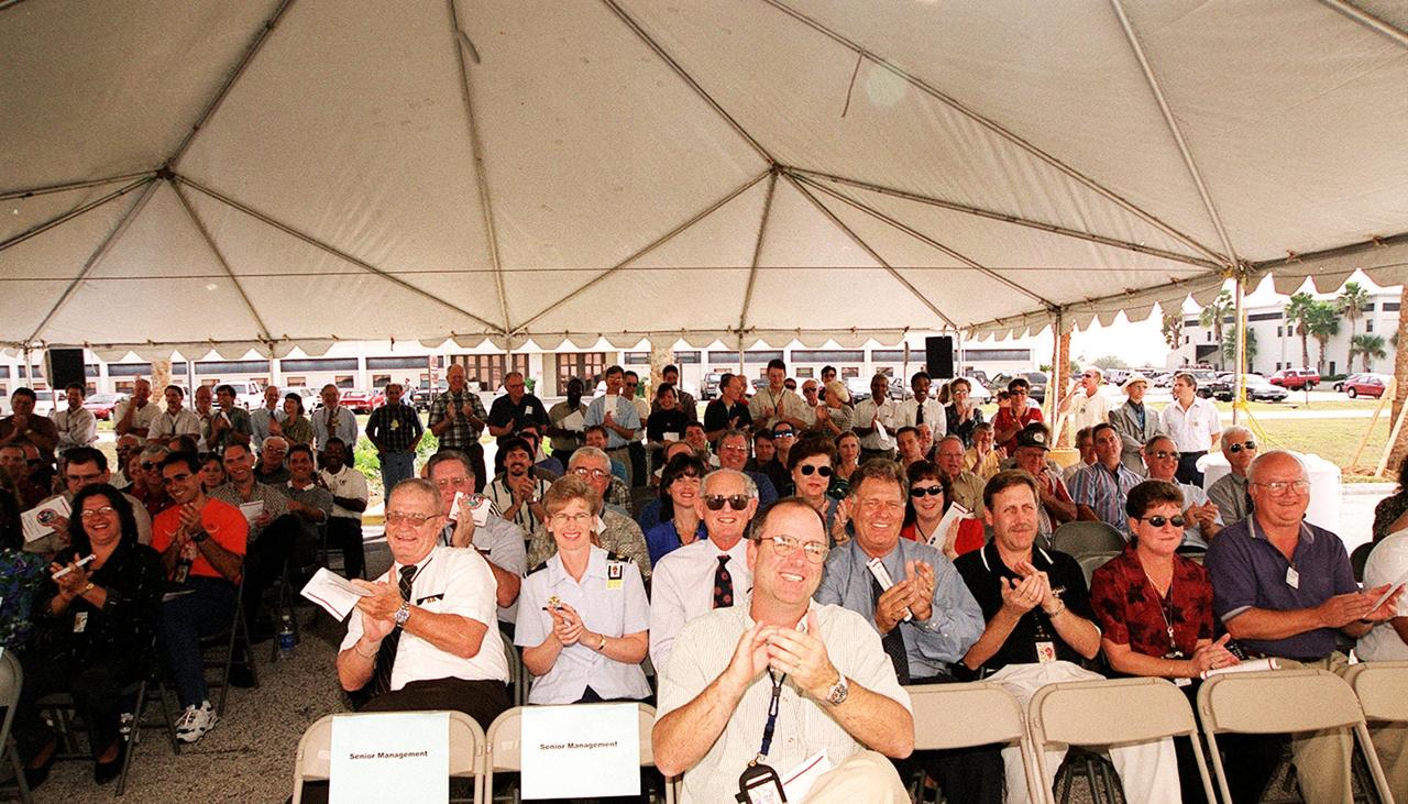 The audience applauds and enjoys the official opening of the E&O Building as the new site of the Expendable Launch Vehicle Program. Home for NASA’s unmanned missions since 1964, the building has been renovated to house the ELV Program.; Cutting the ribbon for the event were Deputy Manager of the ELV and Payload Carrier Programs, Steve Francois; Director of ELV Launch Services, Michael Benik; Center Director Roy Bridges; Manager of the ELV and Payload Carrier Programs, Bobby Bruckner; and Senior Manager of the Boeing ELV Program Support office, Jim Schofield