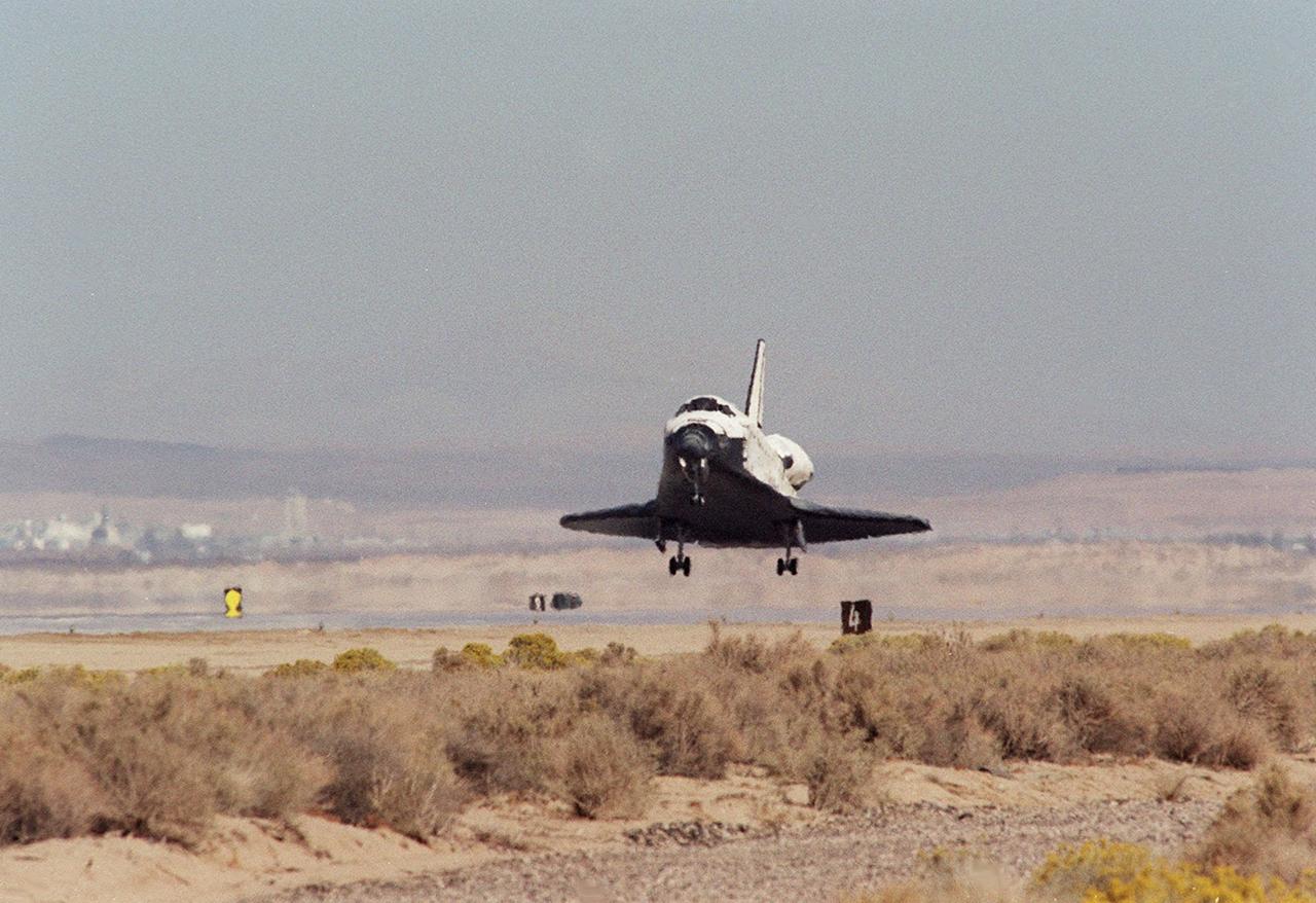 Orbiter Discovery, with its seven-member crew, approaches the landing strip at Edwards Air Force Base, Calif., after an 11-day mission to the International Space Station. The orbiter’s main landing gear touched down on EAFB runway 22 at 5 p.m. With the aid of its drag chute, Discovery came to a complete stop at 5:01 p.m. At the conclusion of mission STS-92, Discovery and crew had traveled about 5.3 million statute miles. Following vehicle safing and preliminary offloading efforts, workers will begin preparations for Discovery’s transcontinental ferry flight back to KSC on the back of NASA’s modified Boeing 747
