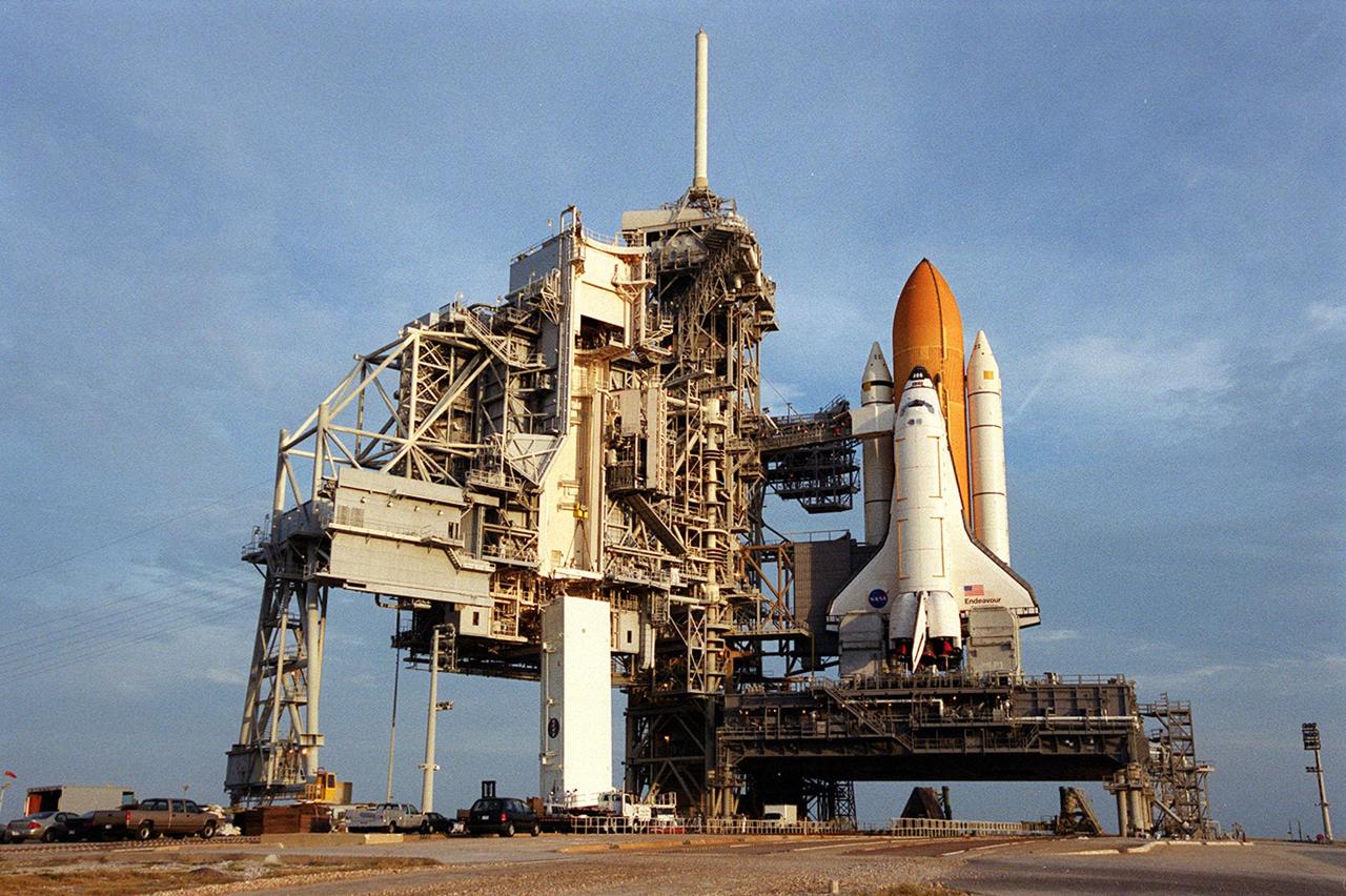 KENNEDY SPACE CENTER, FLA. -- On Launch Pad 39B, the payload transport canister waits at the base of the Rotating Service Structure (RSS) with the P6 integrated truss segment inside. The canister will be lifted up to the payload changeout room (PCR) where the P6 will be removed for transfer to Space Shuttle Endeavour’s payload bay. The PCR is the enclosed, environmentally controlled portion of the RSS that supports payload delivery at the pad and subsequent vertical installation in the orbiter payload bay. The P6, payload on mission STS-97, comprises Solar Array Wing-3 and the Integrated Electronic Assembly, to be installed on the International Space Station. The Station’s electrical power system will use eight photovoltaic solar arrays, each 112 feet long by 39 feet wide, to convert sunlight to electricity. The solar arrays are mounted on a “blanket” that can be folded like an accordion for delivery. Once in orbit, astronauts will deploy the blankets to their full size. Gimbals will be used to rotate the arrays so that they will face the Sun to provide maximum power to the Space Station. Launch of STS-97 is scheduled for Nov. 30 at 10:06 p.m. EST