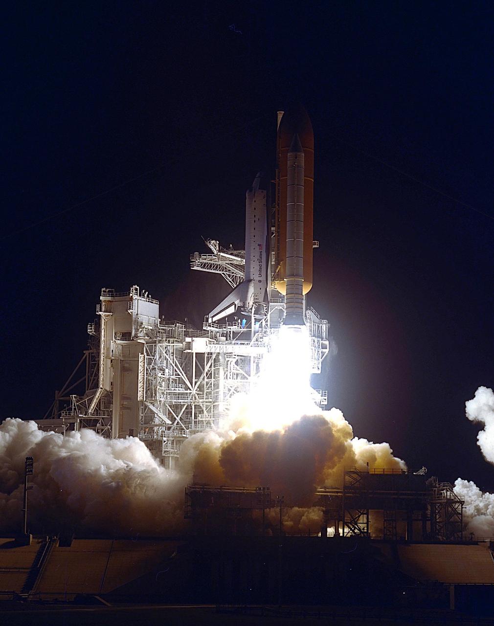 KENNEDY SPACE CENTER, Fla.  --  Bursting forth from the clouds of smoke and steam below, Space Shuttle Endeavour hurtles into the night sky after a perfect launch. Liftoff of Endeavour occurred at 10:06:01 p.m. EST on mission STS-97. Endeavour and its five-member crew will deliver U.S. solar arrays to the International Space Station and be the first Shuttle crew to visit the Station’s first resident crew. The 11-day mission includes three spacewalks. This marks the 101st mission in Space Shuttle history and the 25th night launch. Endeavour is expected to land at KSC Dec. 11 at 6:19 p.m. EST