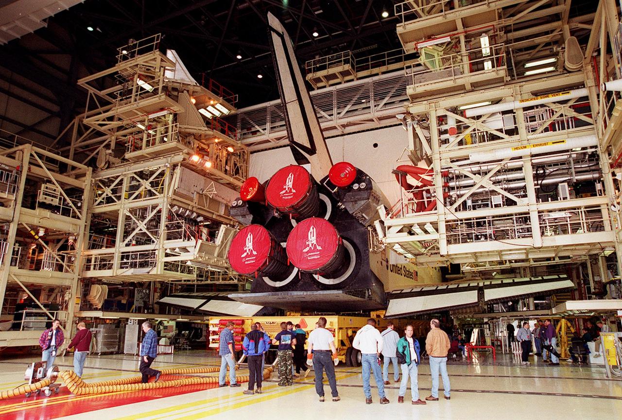 Inside Orbiter Processing Facility bay 3, Atlantis is ready for rollover to the Vehicle Assembly Building. In the VAB it will be raised to vertical and lifted up and into high bay 3 for stacking with its external tank and solid rocket boosters. Atlantis will fly on mission STS-98, the seventh construction flight to the International Space Station. The orbiter will carry in its payload bay the U.S. Laboratory, named Destiny, that will have five system racks already installed inside of the module. After delivery of electronics in the lab, electrically powered attitude control for Control Moment Gyroscopes will be activated. Atlantis is scheduled for launch on Jan. 18, 2001, at 2:44 a.m. EST, with a crew of five