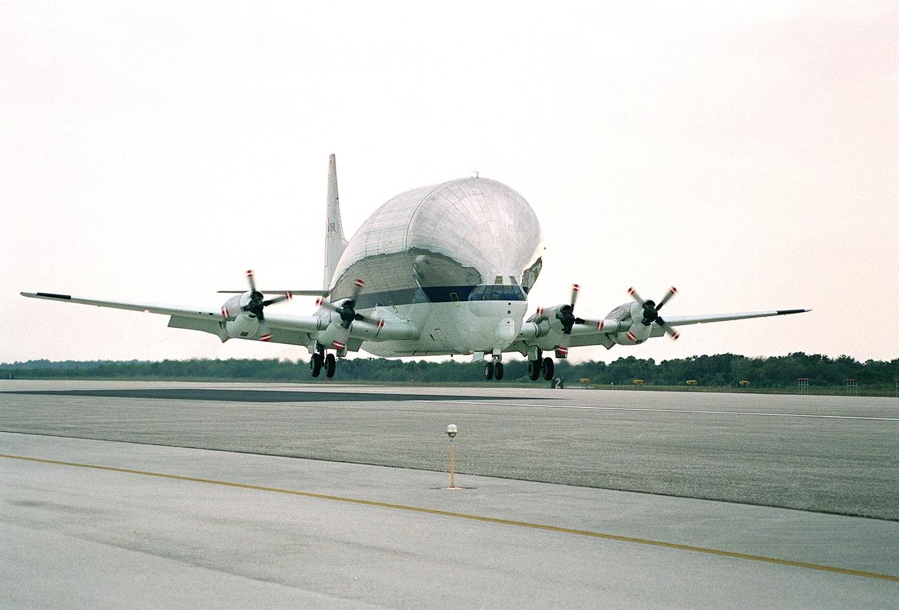 A Super Guppy aircraft arrives at the KSC Shuttle Landing Facility with its cargo of Integrated Truss Structure S3, built by The Boeing Co. After offloading, the S3 will be transported to the Operations and Checkout Building. The second starboard truss segment of the International Space Station, the S3 truss is scheduled to be added to the Station in April 2003