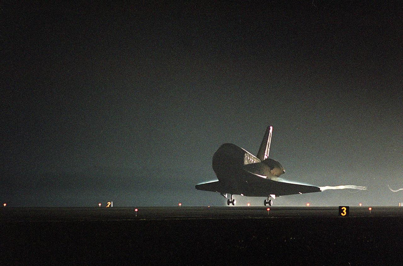 KENNEDY SPACE CENTER, Fla. -- Endeavour touches down on orbit 171on Runway 15 at the Shuttle Landing Facility to complete the successful 10-day, 19-hour and 58-minute-long STS-97 mission. Main gear touchdown was at 6:03:25 p.m. EST; nose gear touchdown at 6:03:34 p.m. EST; and wheel stop at 6:04:20 p.m. EST. At the controls is Commander Brent Jett. Other crew members on board are Pilot Michael Bloomfield and Mission Specialists Joseph Tanner, Carlos Noriega and Marc Garneau of Canada. On the 4.4-million-mile mission, Endeavour carried the P6 Integrated Truss Structure with solar arrays to power the International Space Station. The arrays and other equipment were installed during three EVAs that totaled 19 hours, 20 minutes. Endeavour was docked with the Space Station for 6 days, 23 hours, 13 minutes. This is the 16th nighttime landing for a Space Shuttle and the 53rd at Kennedy Space Center
