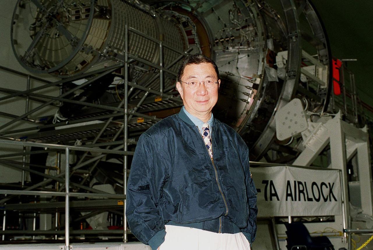 Nobel laureate Professor Samuel C. C. Ting of the Massachusetts Institute of Technology pauses for a photo in the Space Station Processing Facility. Dr. Ting is directing an experiment, an international collaboration of some 37 universities and laboratories, using a state-of-the-art particle physics detector called the Alpha Magnetic Spectrometer (AMS), which will fly on a future launch to the International Space Station. Using the unique environment of space, the AMS will study the properties and origin of cosmic particles and nuclei including antimatter and dark matter. AMS flew initially as a Space Shuttle payload on the June 1998 mission STS-91 that provided the investigating team with data on background sources and verified the detector’s performance under actual space flight conditions. The detector’s second space flight is scheduled to be launched on mission UF-4 October 2003 for installation on the Space Station as an attached payload. Current plans call for operating the detector for three years before it is returned to Earth on the Shuttle. Using the Space Station offers the science team the opportunity to conduct the long-duration research above the Earth’s atmosphere necessary to collect sufficient data required to accomplish the science objectives