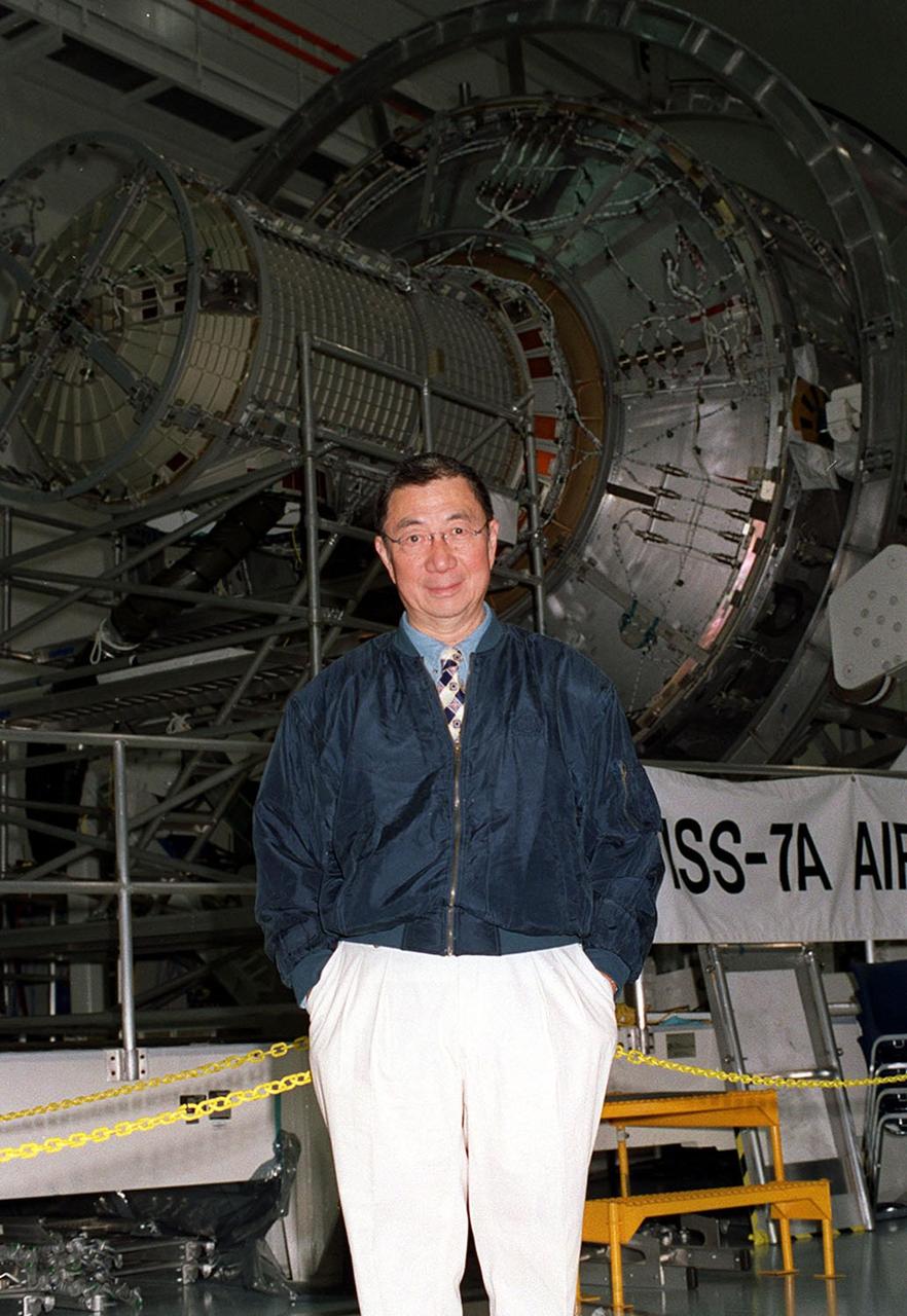 Nobel laureate Professor Samuel C. C. Ting of the Massachusetts Institute of Technology pauses for a photo in the Space Station Processing Facility. Dr. Ting is directing an experiment, an international collaboration of some 37 universities and laboratories, using a state-of-the-art particle physics detector called the Alpha Magnetic Spectrometer (AMS), which will fly on a future launch to the International Space Station. Using the unique environment of space, the AMS will study the properties and origin of cosmic particles and nuclei including antimatter and dark matter. AMS flew initially as a Space Shuttle payload on the June 1998 mission STS-91 that provided the investigating team with data on background sources and verified the detector’s performance under actual space flight conditions. The detector’s second space flight is scheduled to be launched on mission UF-4 October 2003 for installation on the Space Station as an attached payload. Current plans call for operating the detector for three years before it is returned to Earth on the Shuttle. Using the Space Station offers the science team the opportunity to conduct the long-duration research above the Earth’s atmosphere necessary to collect sufficient data required to accomplish the science objectives