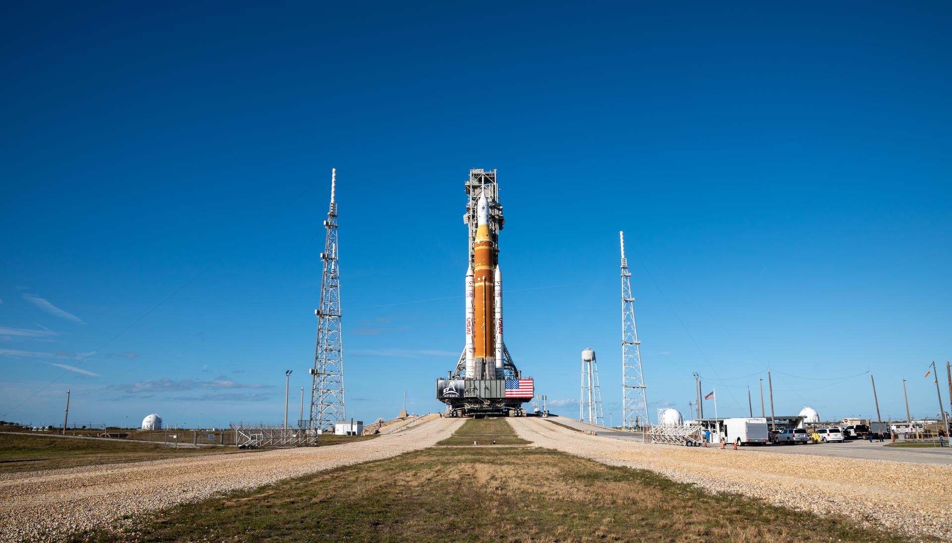 This image shows NASA’s SLS (Space Launch System) and Orion spacecraft rolling out of the Vehicle Assembly Building at NASA’s Kennedy Space Center. NASA's massive Crawler-Transporter, upgraded for the Artemis program, carries the powerful SLS rocket and Orion spacecraft on the Mobile Launcher from the Vehicle Assembly Building to Launch Pad 39B at Kennedy Space Center in preparation for the Artemis II mission. 