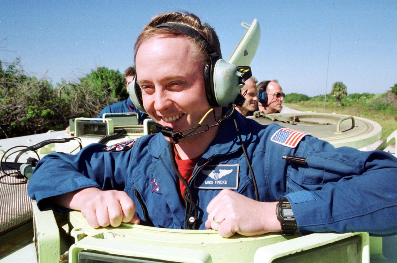 KENNEDY SPACE CENTER, Fla. - Astronaut E. Michael Fincke is ready to practice driving an M-113 armored personnel carrier. Fincke is a backup crew member for the International Space Station Expedition 4 crew, who are flying on Space Shuttle Endeavour as part of mission STS-108.  Both the mission crew and Expedition 4 crews are at KSC for Terminal Countdown Demonstration Test activities.  The TCDT includes emergency exit from the launch pad and a simulated launch countdown. The 11-day mission will also carry the Multi-Purpose Logistics Module Raffaello, filled with supplies and equipment.  STS-108 is scheduled to launch Nov. 29