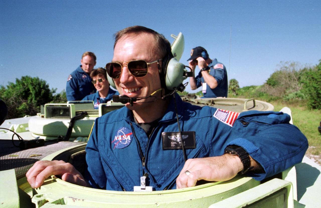 KENNEDY SPACE CENTER, Fla. -- Expedition 4 crew member Carl E. Walz is ready to take his turn driving an M-113 armored personnel carrier.  He and other crew members are taking part in Terminal Countdown Demonstration Test activities, which include emergency exit from the launch pad and a simulated launch countdown.  Walz will be transported to the International Space Station on mission STS-108, targeted for launch Nov. 29 on Space Shuttle Endeavour.  The Expedition 4 crew will spend more than five months living and working on the permanently manned Station and return on mission STS-111 in May 2002