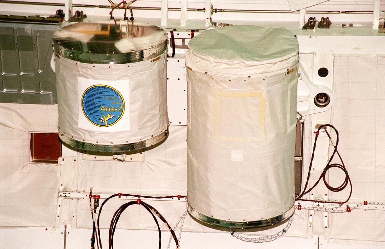 Two GetAway Special canisters (GAS can) are installed in Discovery’s payload bay for mission STS-102. The smaller one, left, is filled with student experiments from schools in St. Louis (hosted by Washington University at St. Louis). The larger, at right, is an experiment on Shuttle vibration force. STS-102 is the 8th construction flight to the International Space Station and will carry the Multi-Purpose Logistics Module Leonardo. STS-102 is scheduled for launch March 1, 2001. On that flight, Leonardo will be filled with equipment and supplies to outfit the U.S. laboratory module Destiny. The mission will also be carrying the Expedition Two crew to the Space Station, replacing the Expedition One crew who will return on Shuttle Discovery
