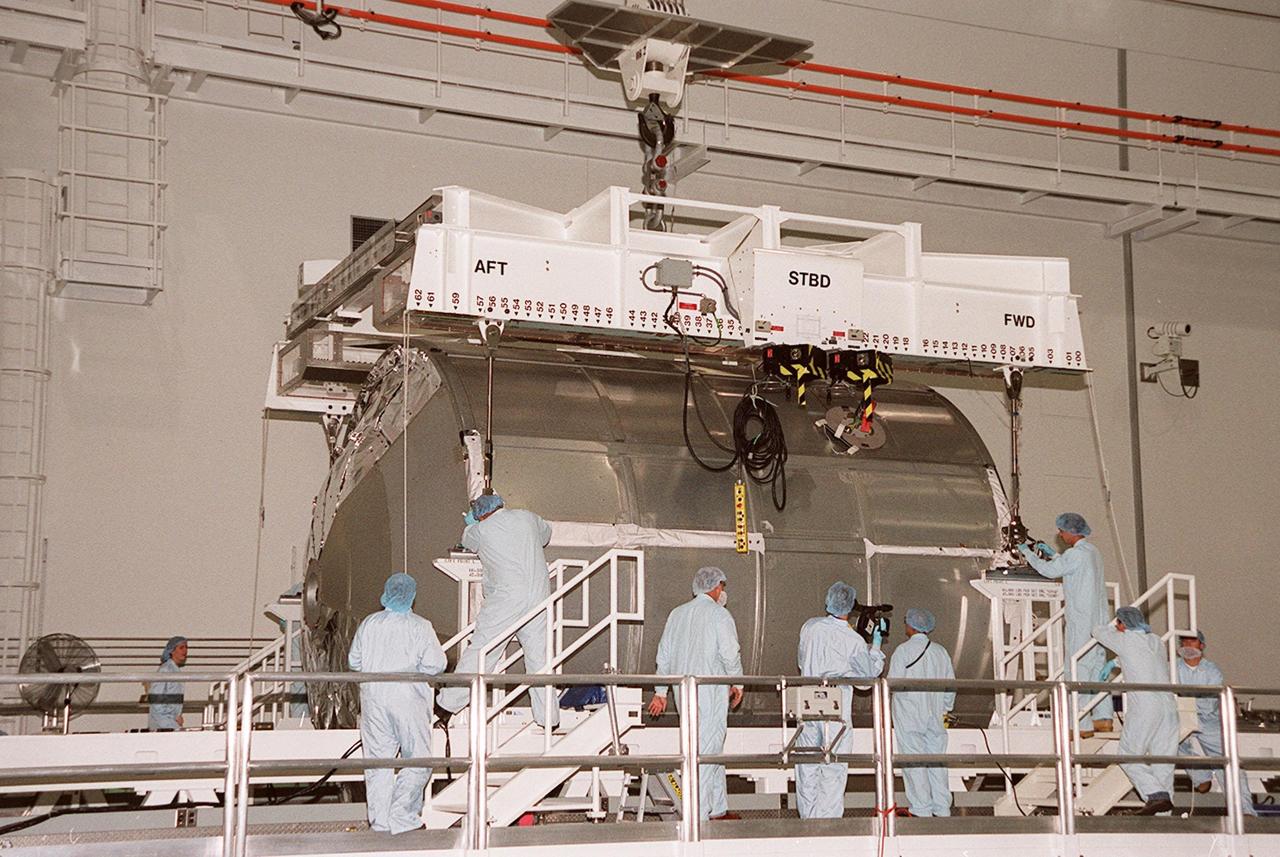 In the Space Station Processing Facility, the Multi-Purpose Logistics Module Leonardo finally rests on the weight and balance scale. The Italian-built MPLM is one of three such pressurized modules that will serve as the International Space Station's "moving vans," carrying laboratory racks filled with equipment, experiments and supplies to and from the station aboard the Space Shuttle. The cylindrical module is approximately 21 feet long and 15 feet in diameter, weighing almost 4.1 metric tons. It can carry up to 9.1 metric tons of cargo packed into 16 standard space station equipment racks. The Leonardo will be launched on mission STS-102 March 8. On that flight, Leonardo will be filled with equipment and supplies to outfit the U.S. laboratory module, to be carried to the ISS on the Feb. 7 launch of STS-98