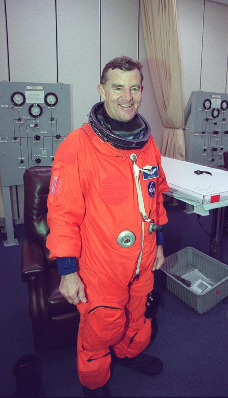 STS-102 Mission Specialist James Voss poses in his launch and entry suit that he will wear during a simulated launch countdown. He and other crew members are taking part in Terminal Countdown Demonstration Test activities, which include the simulation. Voss is also part of the Expedition Two crew who will be replacing Expedition One on the International Space Station. He will serve as a flight engineer during the crew’s four-month residence on the Station. STS-102 is the eighth construction flight to the Space Station, with Discovery carrying the Multi-Purpose Logistics Module Leonardo. Expedition One will return to Earth with Discovery. Launch on mission STS-102 is scheduled for March 8
