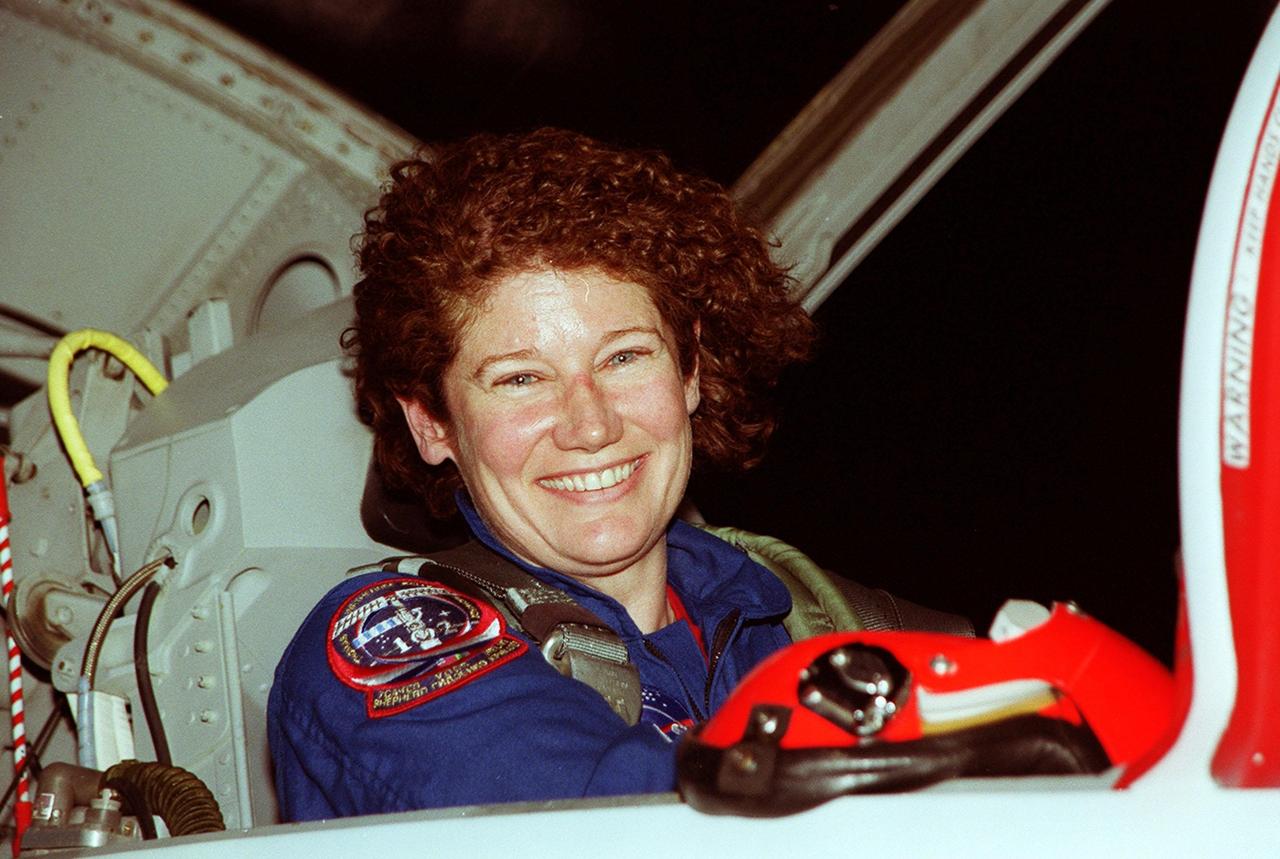 STS-102 Mission Specialist Susan V. Helms smiles on her arrival for launch. She is also one of the Expedition Two crew who will be replacing Expedition One on the International Space Station. STS-102 will be carrying the Multi-Purpose Logistics Module Leonardo, the primary delivery system used to resupply and return Station cargo requiring a pressurized environment. Leonardo will deliver up to 10 tons of laboratory racks filled with equipment, experiments and supplies for outfitting the newly installed U.S. Laboratory Destiny. STS-102 is scheduled to launch March 8 at 6:42 a.m. EST