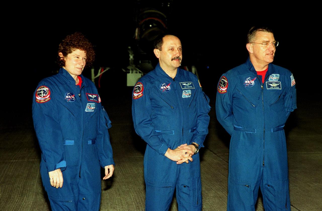 After their arrival at the Shuttle Landing Facility, STS-102 Mission Specialists (left to right) Susan Helms, Yury Usachev and James Voss happily greet the media. They are also the Expedition Two crew replacing Expedition One on the International Space Station. STS-102 will be carrying the Multi-Purpose Logistics Module Leonardo, the primary delivery system used to resupply and return Station cargo requiring a pressurized environment. Leonardo will deliver up to 10 tons of laboratory racks filled with equipment, experiments and supplies for outfitting the newly installed U.S. Laboratory Destiny. STS-102 is scheduled to launch March 8 at 6:42 a.m. EST
