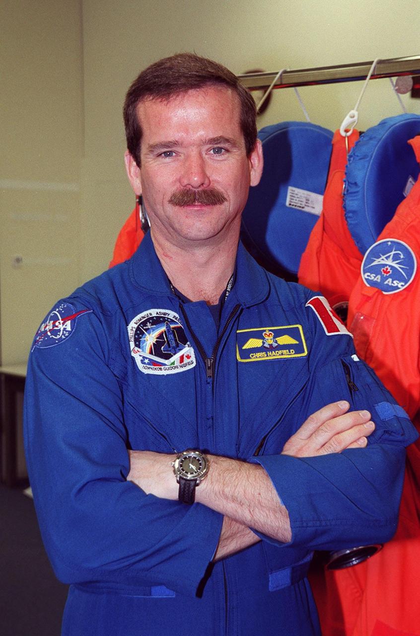 STS-100 Mission Specialist Chris Hadfield pauses for the camera during Terminal Countdown Demonstration Test activities that include emergency escape training at the pad and a simulated launch countdown. The mission is carrying the Multi-Purpose Logistics Module Raffaello and the Canadian robotic arm, SSRMS, to the International Space Station. Raffaello carries six system racks and two storage racks for the U.S. Lab. The SSRMS is crucial to the continued assembly of the orbiting complex. Launch of mission STS-100 is scheduled for April 19 at 2:41 p.m. EDT from Launch Pad 39A