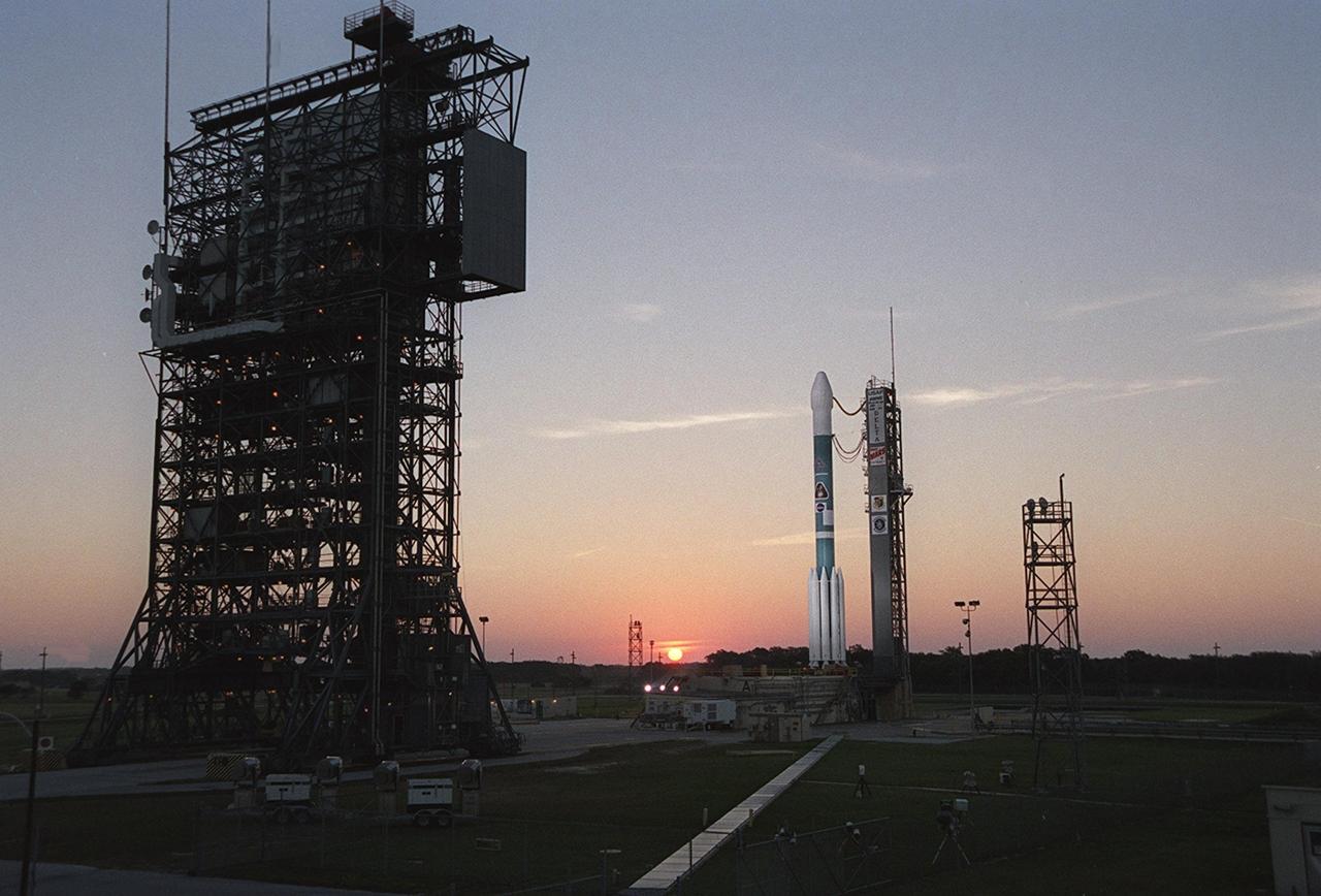  The sun creeps over the horizon as the Boeing Delta II rocket stands ready for launch after tower rollback. It is carrying the 2001 Mars Odyssey spacecraft that will begin a 7-month journey to Mars. Liftoff is scheduled for 11:02 a.m. EDT. The spacecraft, built by Lockheed Martin Space Systems for the Jet Propulsion Laboratory, will orbit Mars, mapping the surface looking for geological features that could indicate the presence of water, now or in the past. Science gathered by three science instruments on board will be key to future missions to Mars, including orbital reconnaissance, lander and human missions