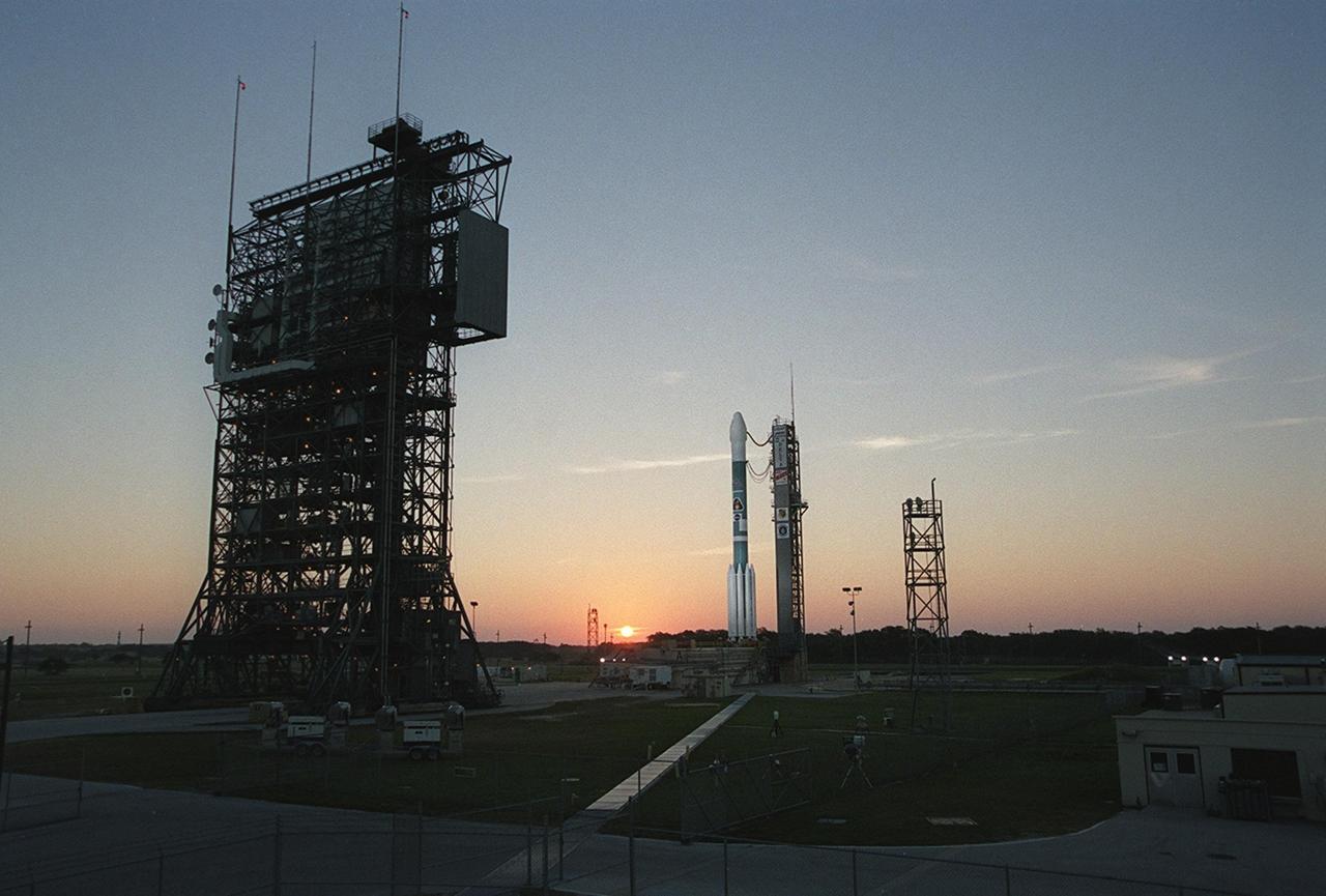  The rising sun paints the horizon pink as the Boeing Delta II rocket stands ready for launch after tower rollback. It is carrying the 2001 Mars Odyssey spacecraft that will begin a 7-month journey to Mars. Liftoff is scheduled for 11:02 a.m. EDT. The spacecraft, built by Lockheed Martin Space Systems for the Jet Propulsion Laboratory, will orbit Mars, mapping the surface looking for geological features that could indicate the presence of water, now or in the past. Science gathered by three science instruments on board will be key to future missions to Mars, including orbital reconnaissance, lander and human missions