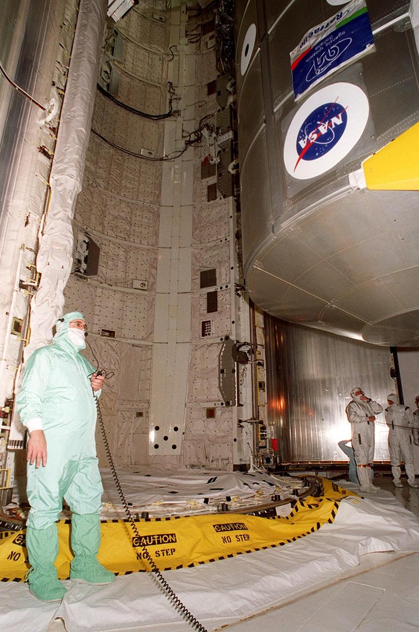  At Launch Pad 39A, the payload on mission STS-100 is in the payload changeout room, from which it will be transferred to the Endeavour’s payload bay. Visible is the Multi-Purpose Logistics Module Raffaello. Above it, but not visible, is the Canadian robotic arm, the SSRMS. Raffaello carries six system racks and two storage racks for the U.S. Lab. The SSRMS is capable of handling large payloads and assisting with docking the Space Shuttle. It is crucial to the continued assembly of the International Space Station. Launch of mission STS-100 is scheduled for April 19 at 2:41 p.m. EDT