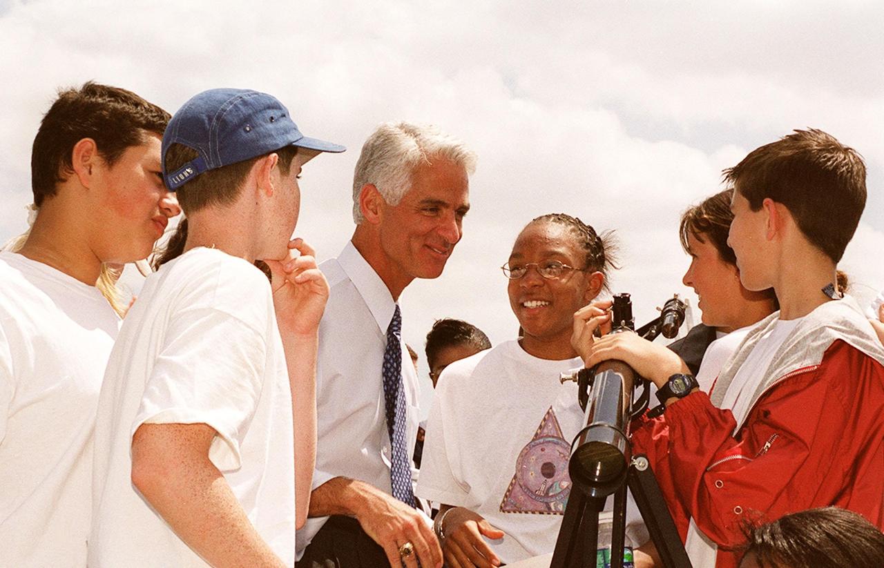 KENNEDY SPACE CENTER, FLA. -- State Education Commissioner Charlie Crist (center) talks to students from Ronald McNair Magnet School, Cocoa, Fla., after launch of  Space Shuttle Endeavour on mission STS-100. Crist was commemorating the 20th anniversary of Space Shuttle program with his visit to KSC for the launch