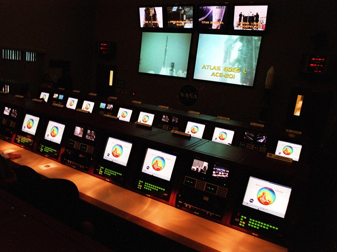 State-of-the-art displays shown here provide enhanced capability to engineers in the upgraded Launch Vehicle Data Center in Hangar AE, Cape Canaveral Air Force Station, Fla. The new facility’s three individual control rooms replace a single LVDC control room in use since the mid-1970s. Developed by NASA-KSC to support multiple test operations in parallel or a single large launch operation, the new LVDC allows up to 100 launch vehicle engineers to monitor the voice, data and video systems that support the checkout and launch of an expendable vehicle