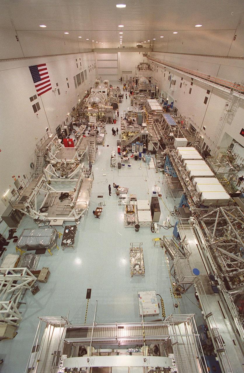 A vertical view of the Space Station Processing Facility shows the lineup of elements in various stages of preparation for future flights to the Space Station.
