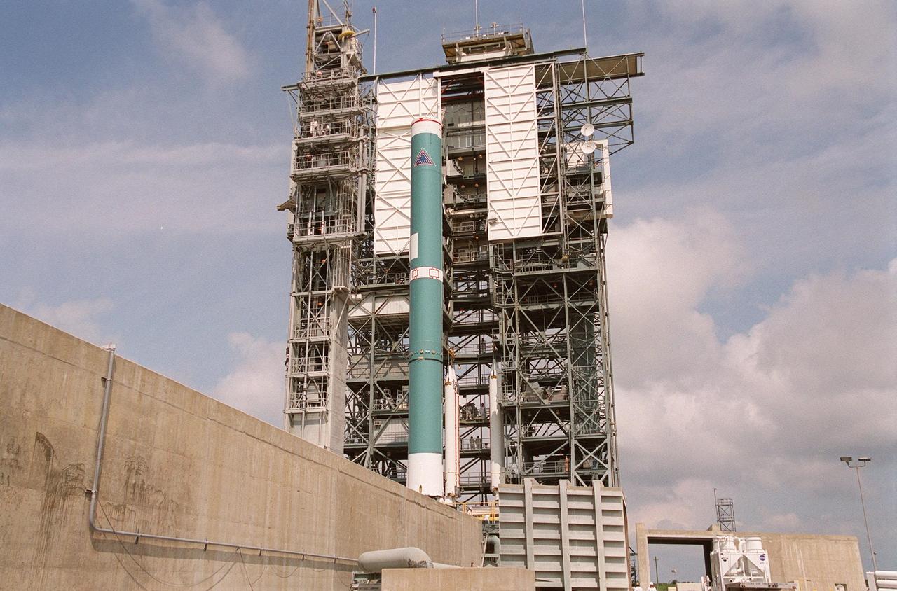 KENNEDY SPACE CENTER, FLA. -- On Launch Complex 17-B, Cape Canaveral Air Force Station, the Delta II rocket waits to be mated to four solid rocket boosters (behind the Delta). The rocket will launch the MAP instrument into a lunar-assisted trajectory to the Sun-Earth for a 27-month mission. The MAP mission will examine conditions in the early universe by measuring temperature differences in cosmic microwave background radiation, which is the radiant heat left over from the Big Bang. The properties of this radiation directly reflect conditions in the early universe. MAP is scheduled to launch June 30 at 3:46:46 p.m. EDT