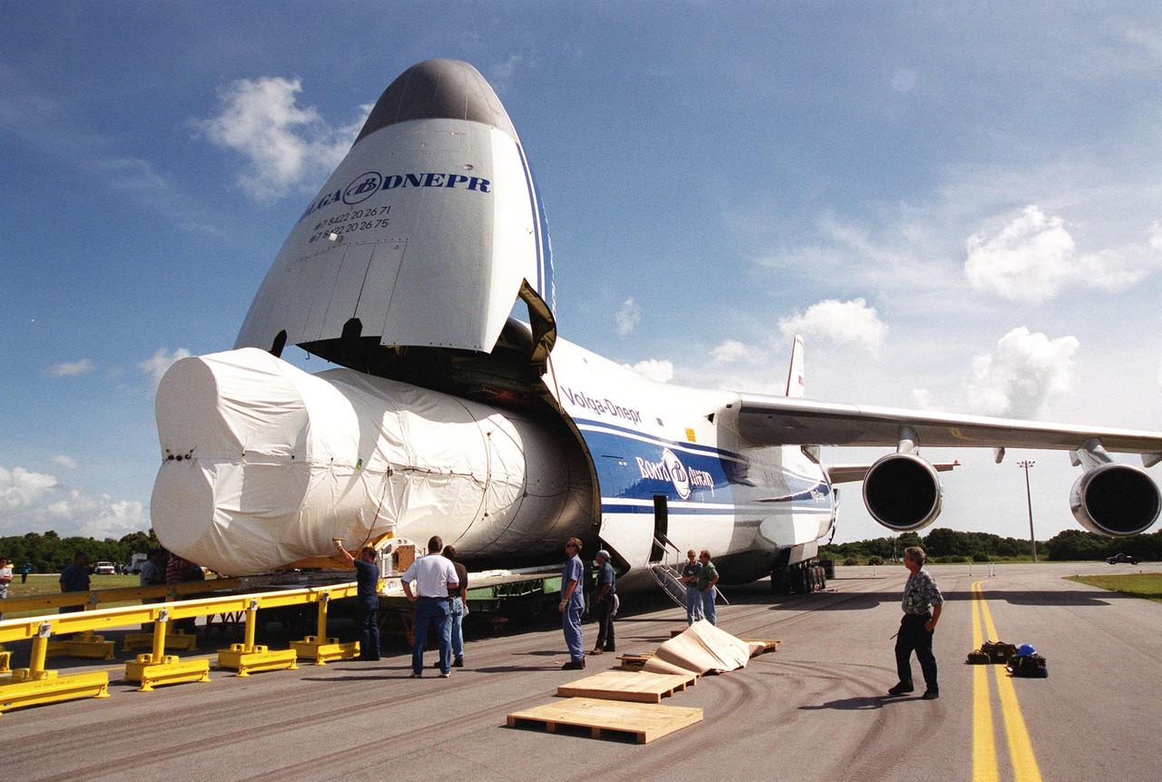 KENNEDY SPACE CENTER, Fla. -- Stages of the first Atlas V rocket are offloaded from a Russian Antonov AN-124 aircraft after their arrival at the Skid Strip at Cape Canaveral Air Force Station. The booster will be joined to its Centaur upper stage for testing and checkout in preparation for launch in May 2002