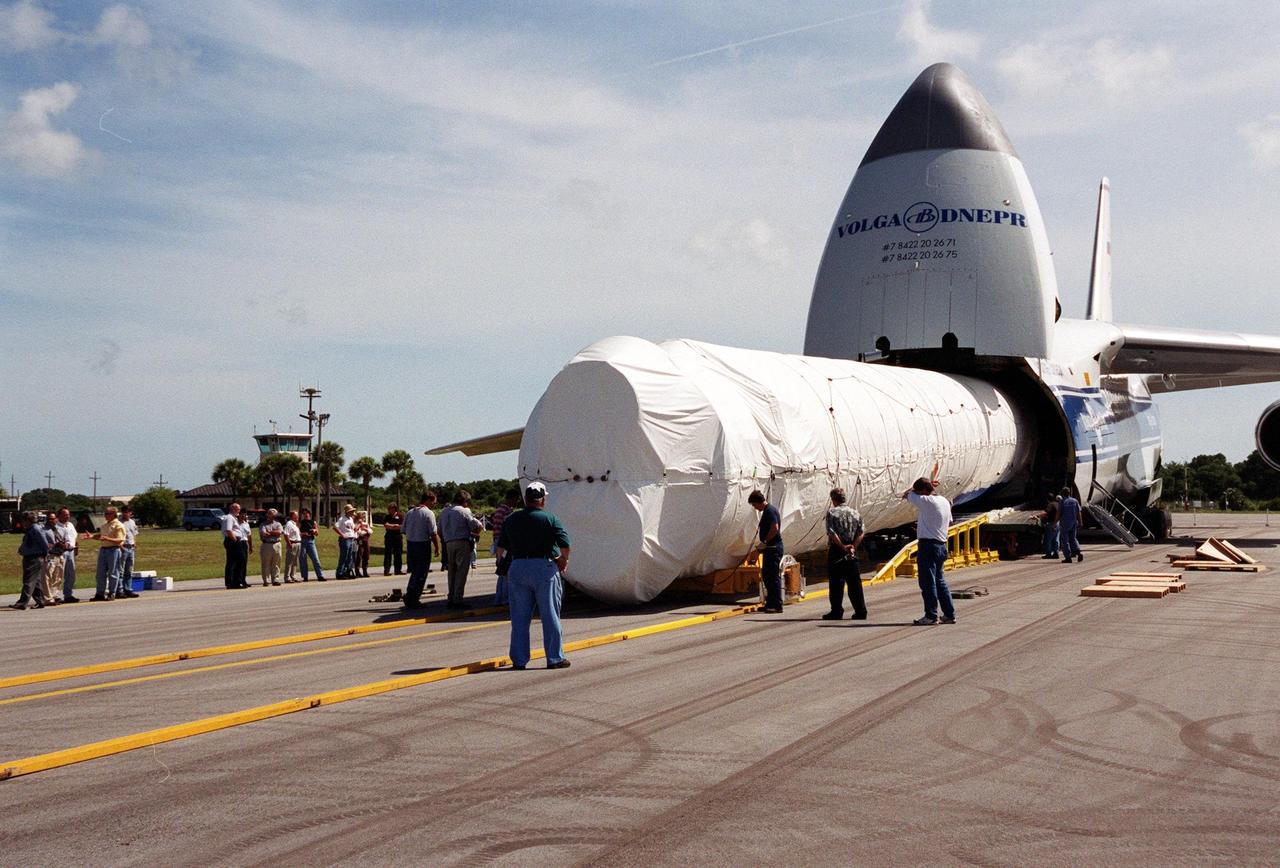 KENNEDY SPACE CENTER, Fla. -- Stages of the first Atlas V rocket are offloaded from a Russian Antonov AN-124 aircraft after their arrival at the Skid Strip at Cape Canaveral Air Force Station. The Atlas V will be joined to its Centaur upper stage for testing and checkout in preparation for a May 2002 launch