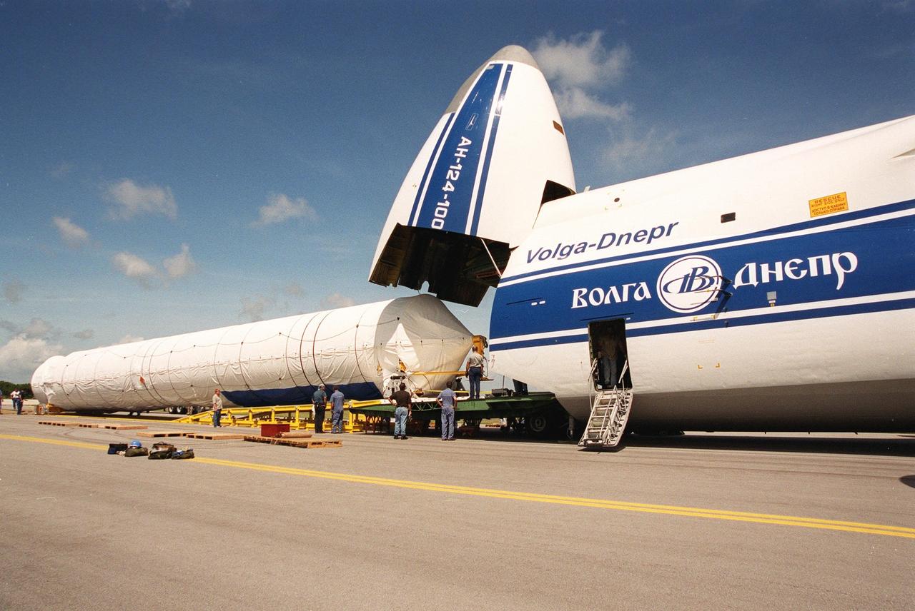 KENNEDY SPACE CENTER, Fla. -- Stages of the first Atlas V rocket are offloaded from a Russian Antonov AN-124 aircraft after their arrival at the Skid Strip at Cape Canaveral Air Force Station. The Antonov AN-124 is the only carrier large enough to carry the Atlas V. The rocket will be joined to its Centaur upper stage and testing will begin in preparation for a May 2002 launch